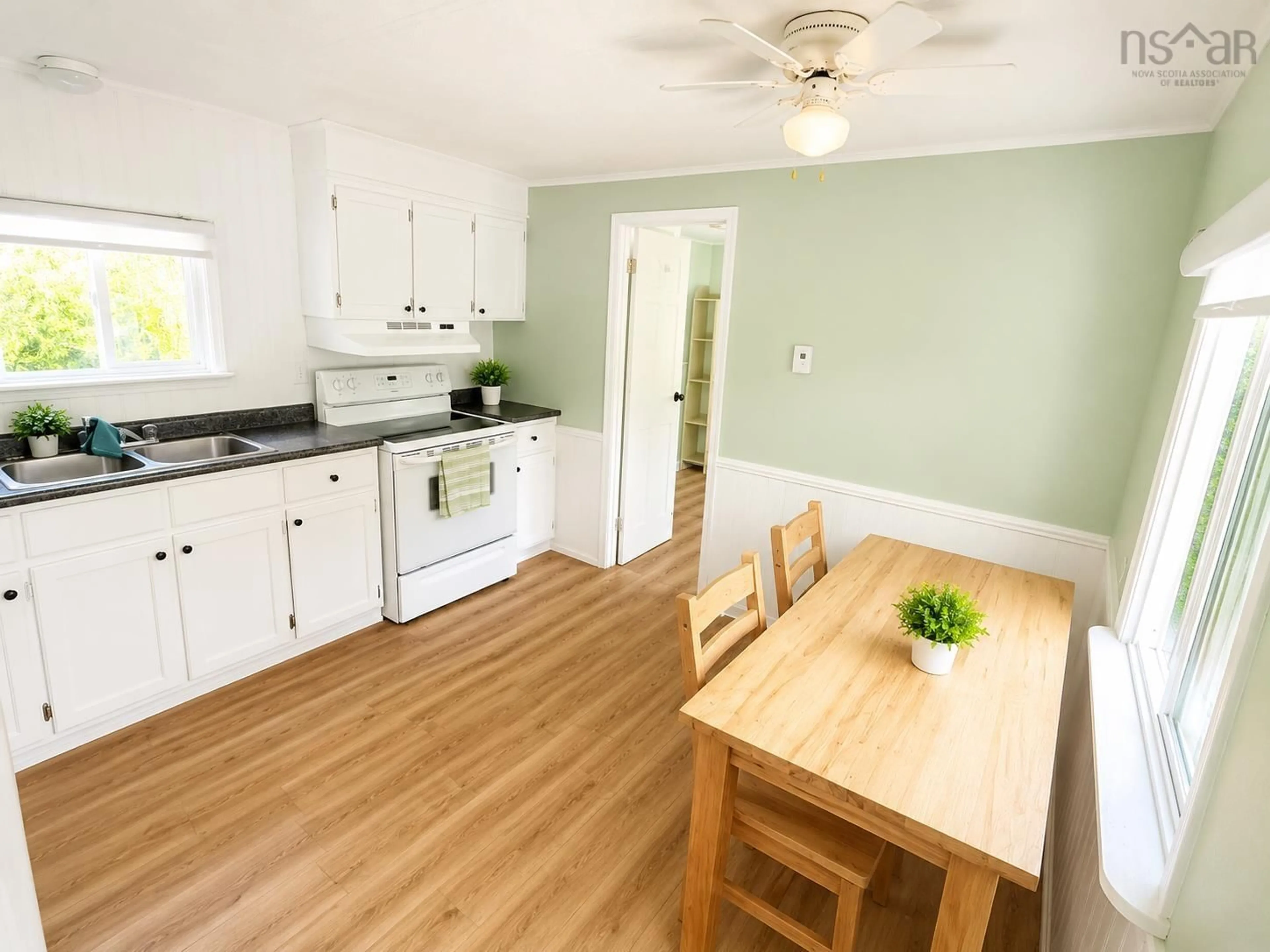 Standard kitchen, wood/laminate floor for 73 Old Post Rd, Barrington Nova Scotia B0W 1E0