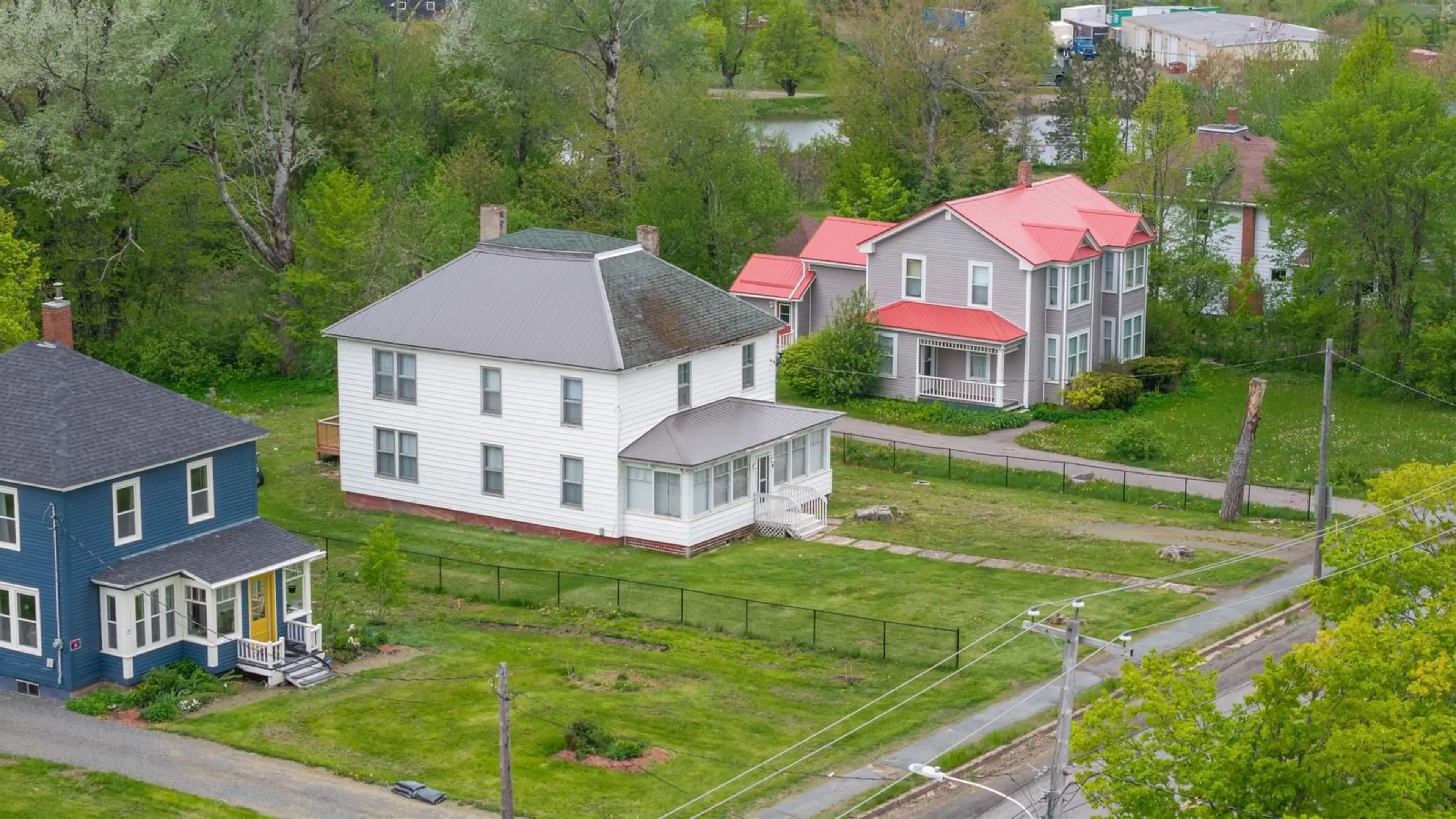 A pic from outside/outdoor area/front of a property/back of a property/a pic from drone, unknown for 15 Mcdougal St, Springhill Nova Scotia B0M 1X0