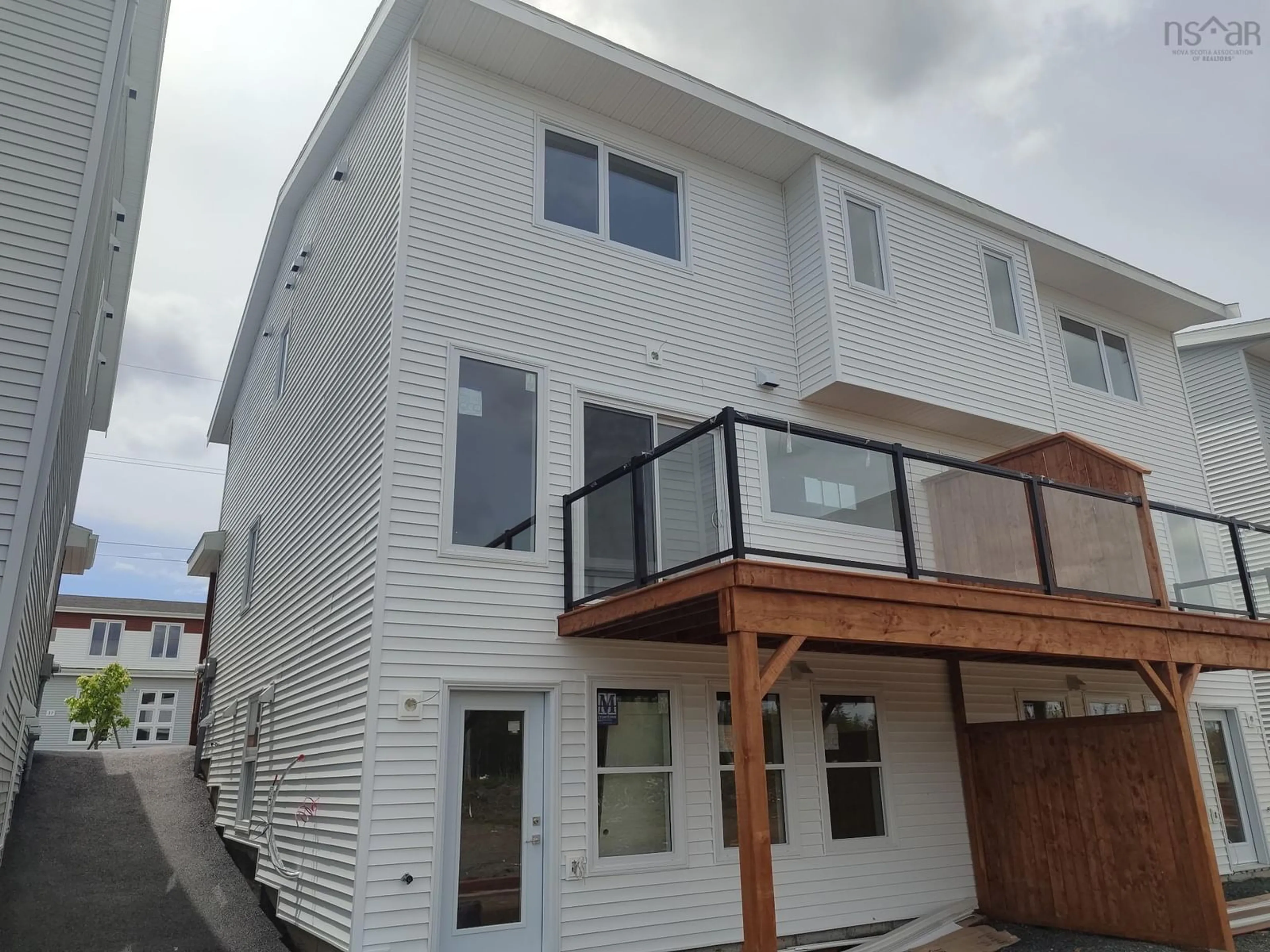 Home with vinyl exterior material, street for 36 Berm St, Spryfield Nova Scotia B3R 0H2