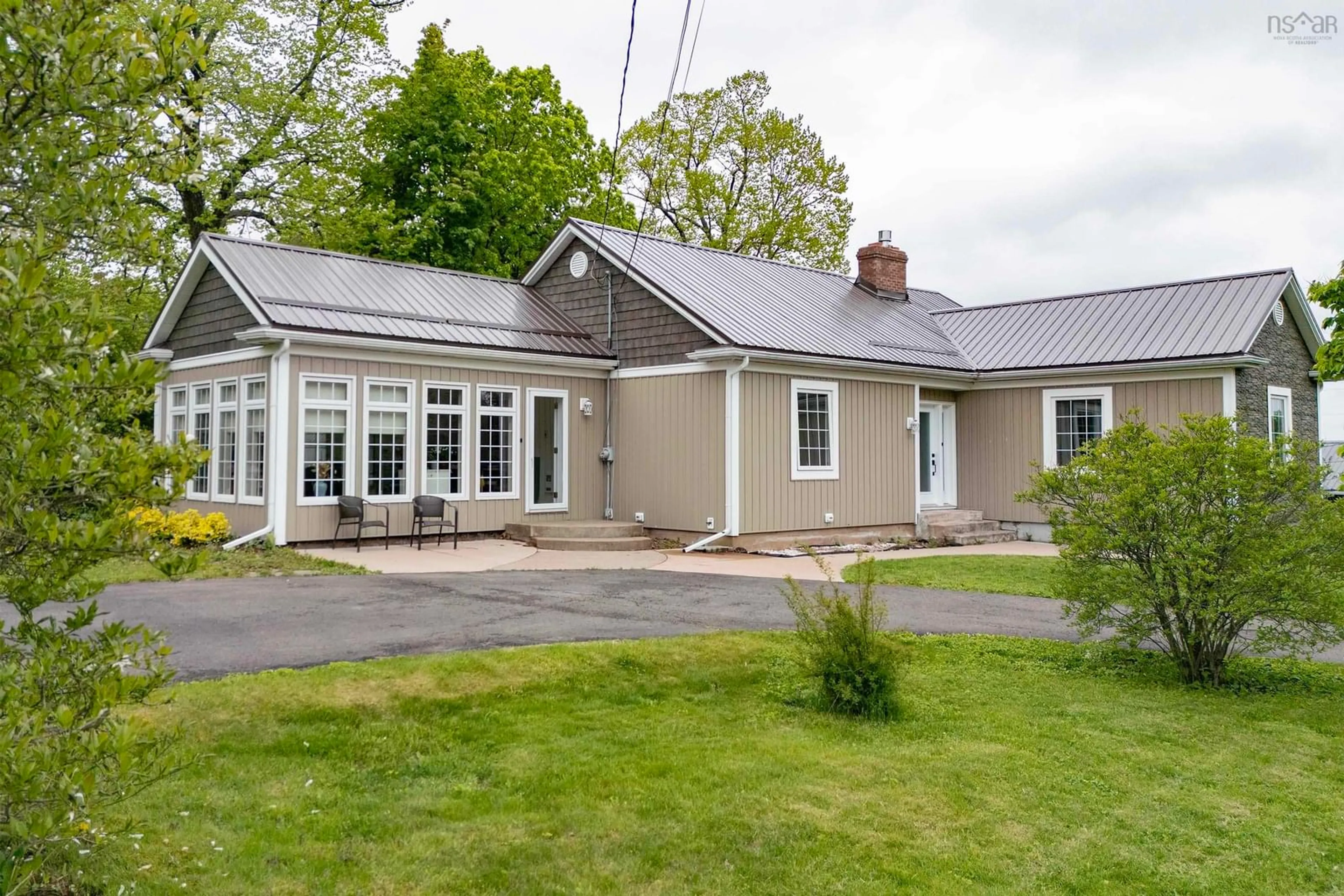 A pic from outside/outdoor area/front of a property/back of a property/a pic from drone, street for 2 Lamy St, Amherst Nova Scotia B4H 3T9