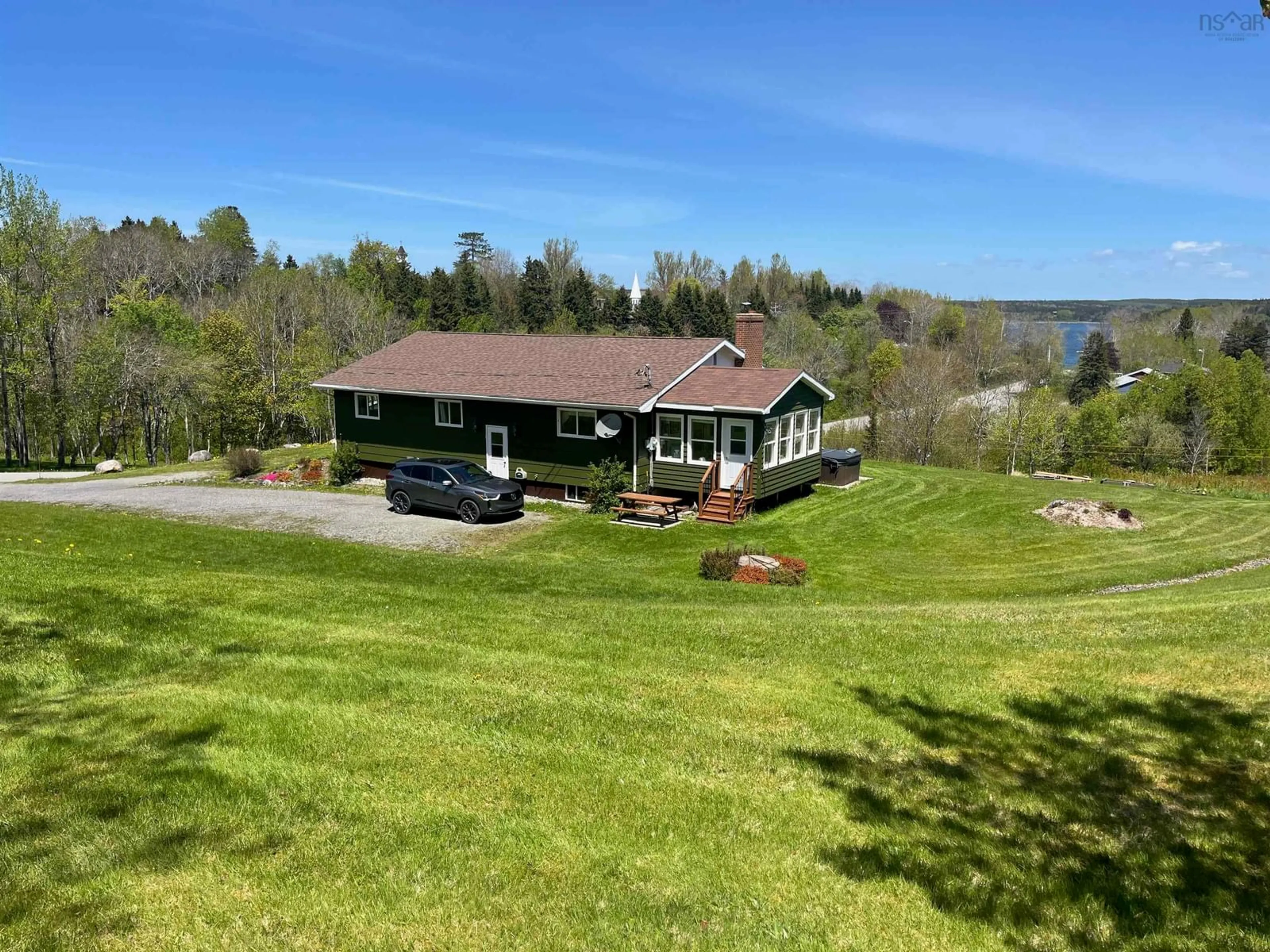 A pic from outside/outdoor area/front of a property/back of a property/a pic from drone, water/lake/river/ocean view for 104 Green Street, Guysborough Nova Scotia B0H 1N0