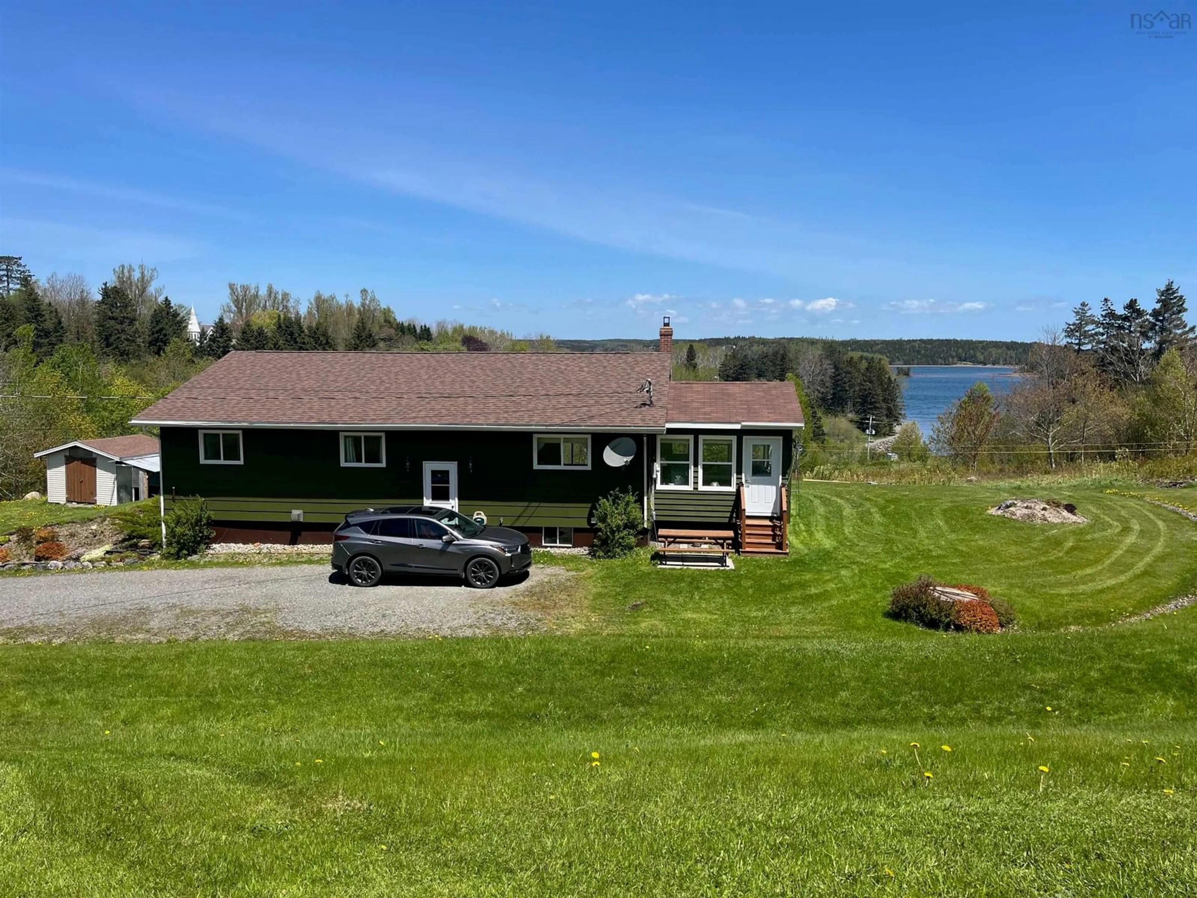 A pic from outside/outdoor area/front of a property/back of a property/a pic from drone, water/lake/river/ocean view for 104 Green Street, Guysborough Nova Scotia B0H 1N0