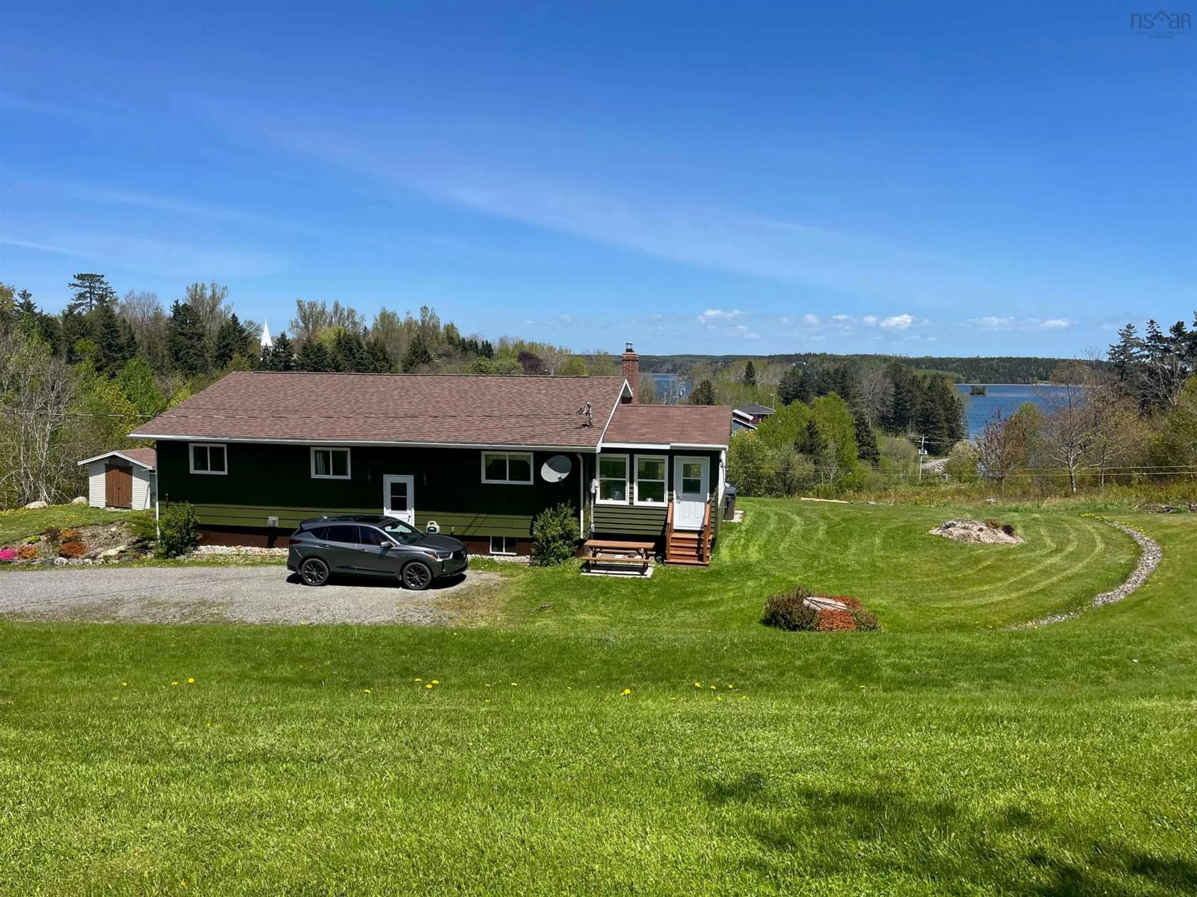 A pic from outside/outdoor area/front of a property/back of a property/a pic from drone, water/lake/river/ocean view for 104 Green Street, Guysborough Nova Scotia B0H 1N0