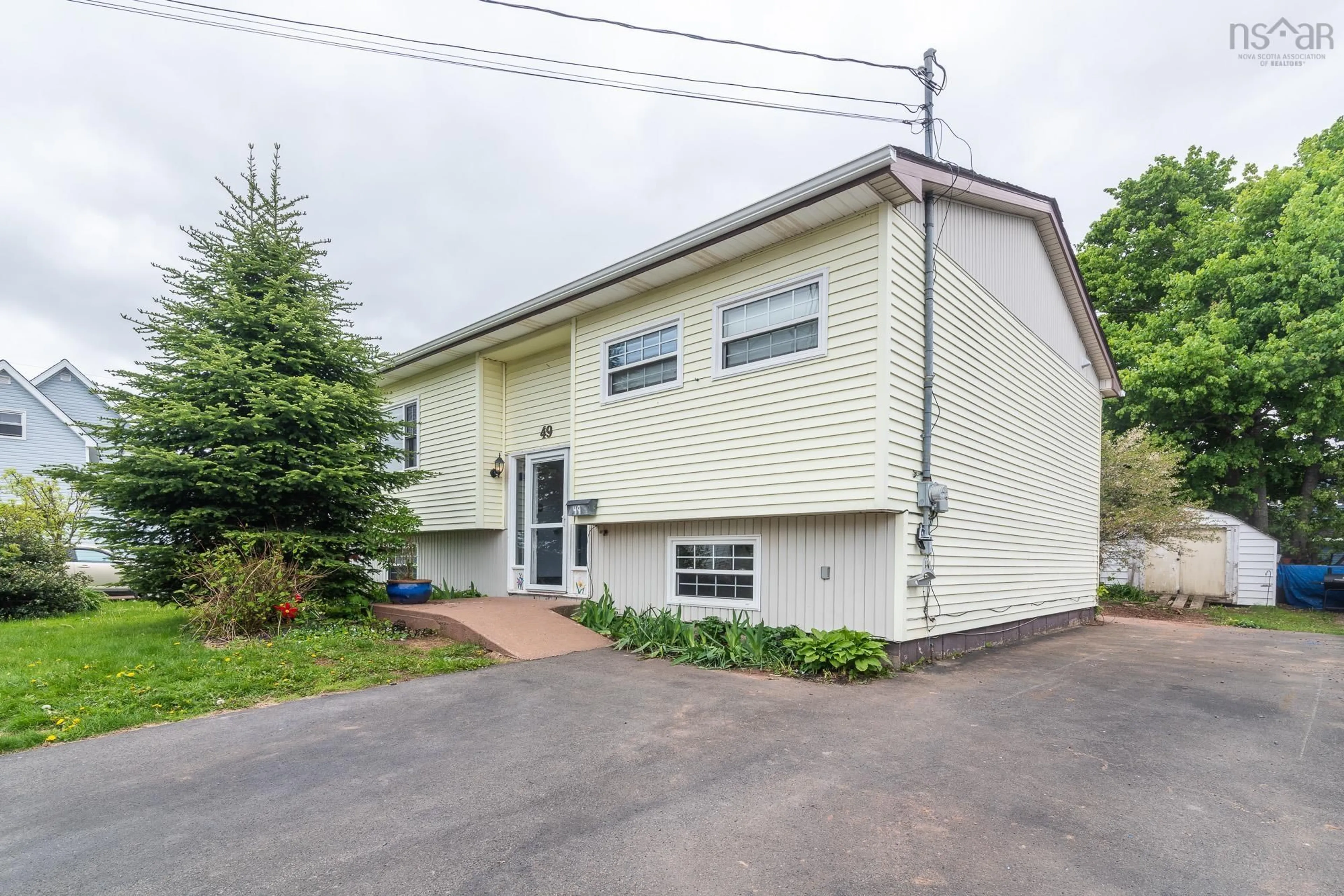 A pic from outside/outdoor area/front of a property/back of a property/a pic from drone, street for 49 Hill St, Amherst Nova Scotia B4H 2N2