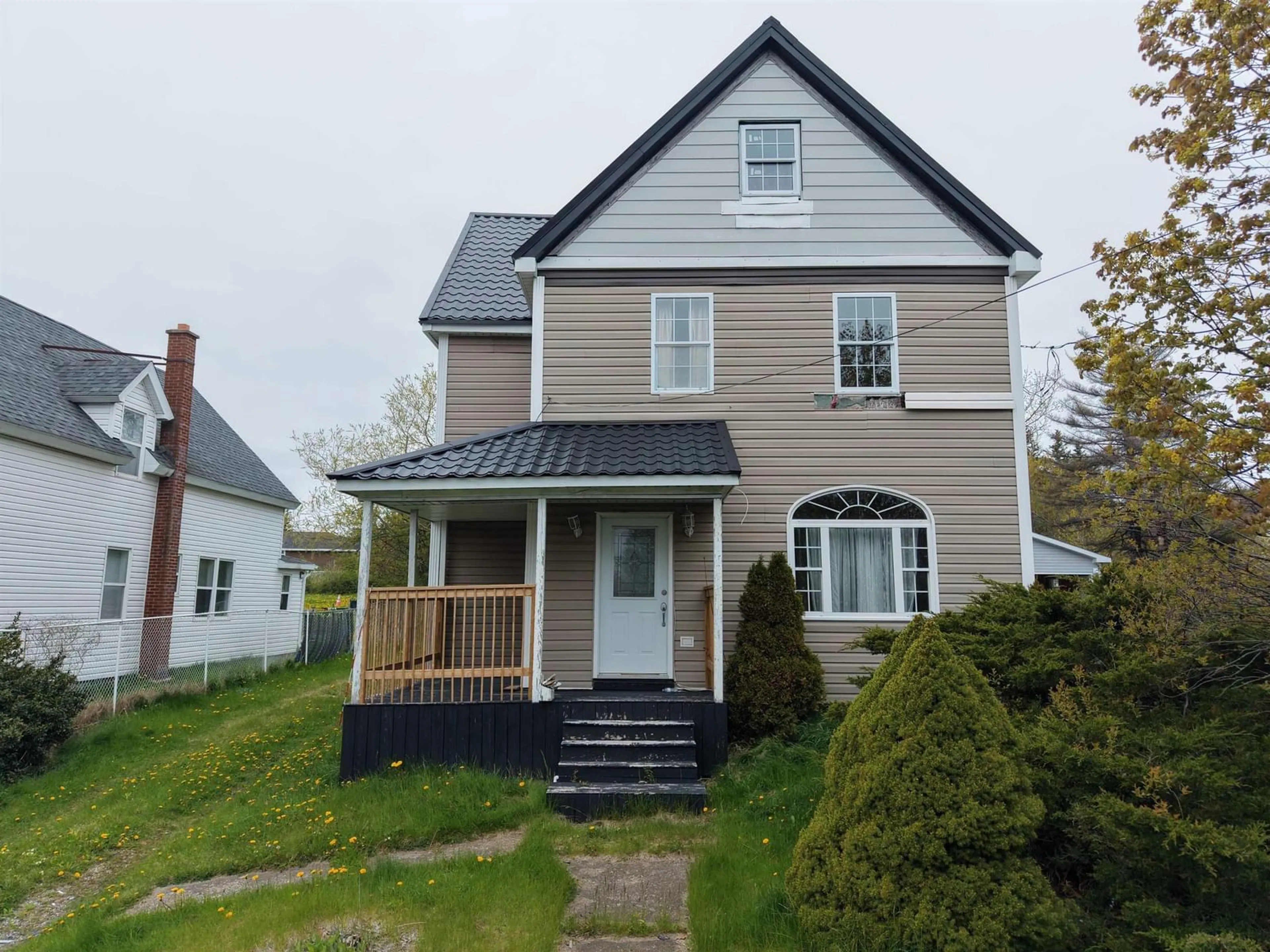Home with vinyl exterior material, street for 24 Reserve St St, Glace Bay Nova Scotia B1A 4V8