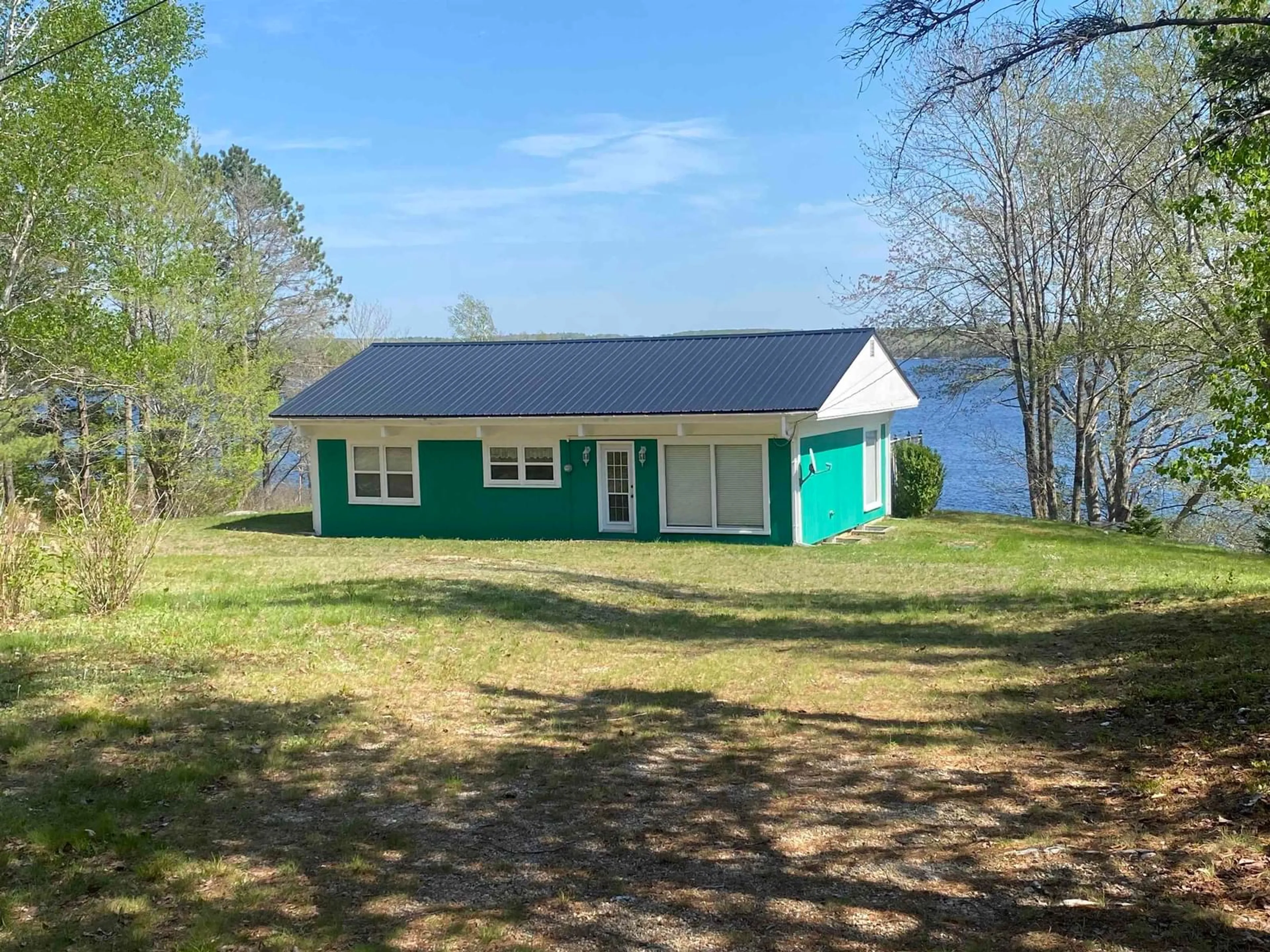 A pic from outside/outdoor area/front of a property/back of a property/a pic from drone, water/lake/river/ocean view for 70 Whispering Pines Lane Lane, North Range Nova Scotia B0W 1H0