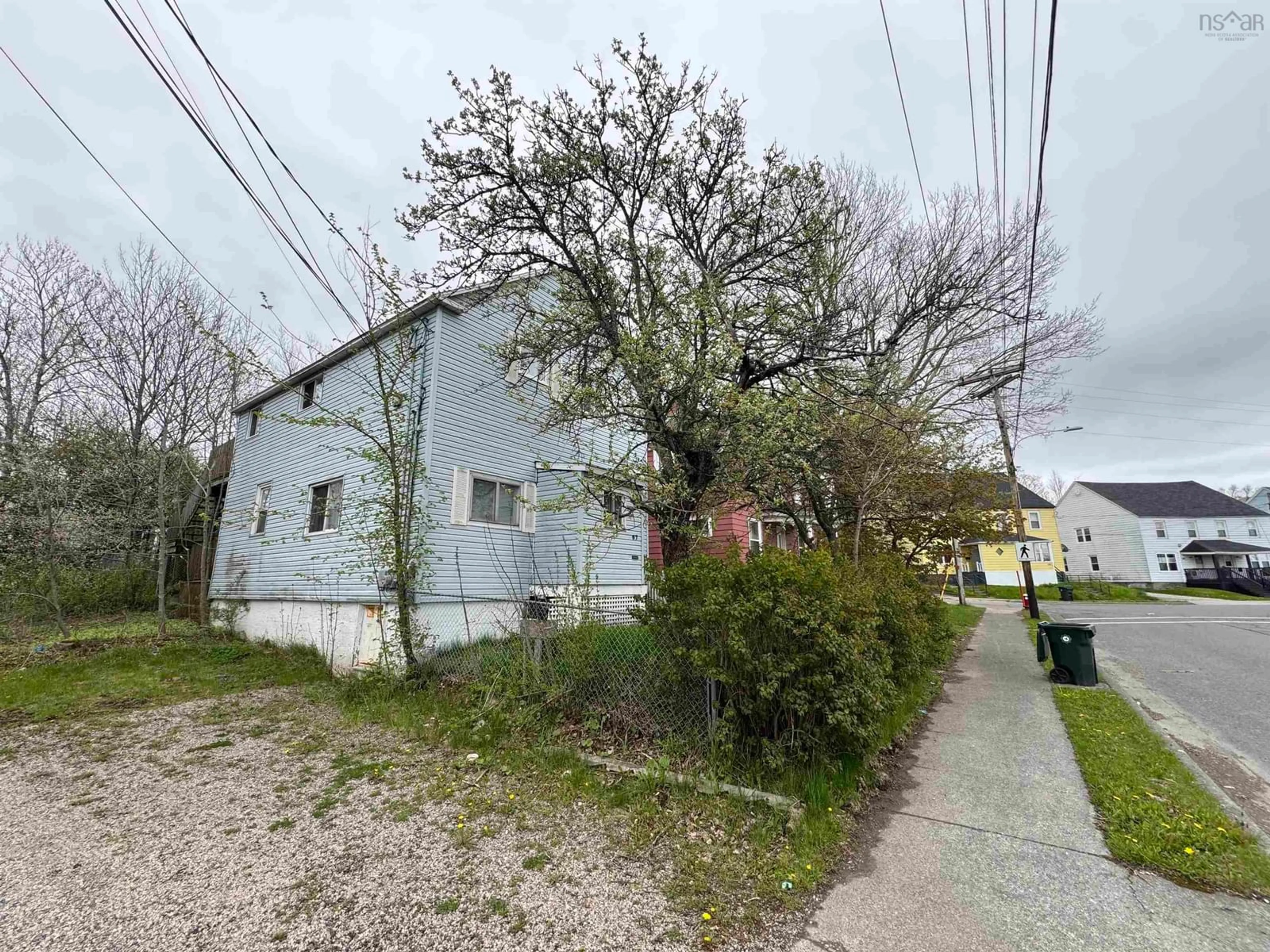A pic from outside/outdoor area/front of a property/back of a property/a pic from drone, street for 67 Sheriff Ave, Sydney Nova Scotia B1P 2P6
