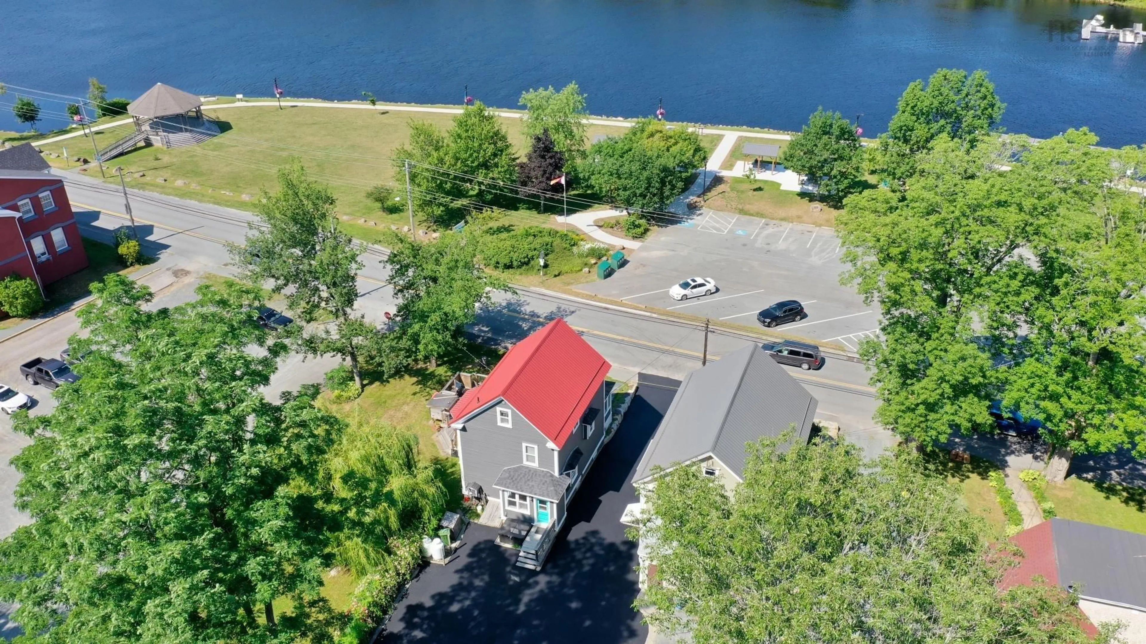 A pic from outside/outdoor area/front of a property/back of a property/a pic from drone, water/lake/river/ocean view for 185 King St, Bridgewater Nova Scotia B4V 1A5