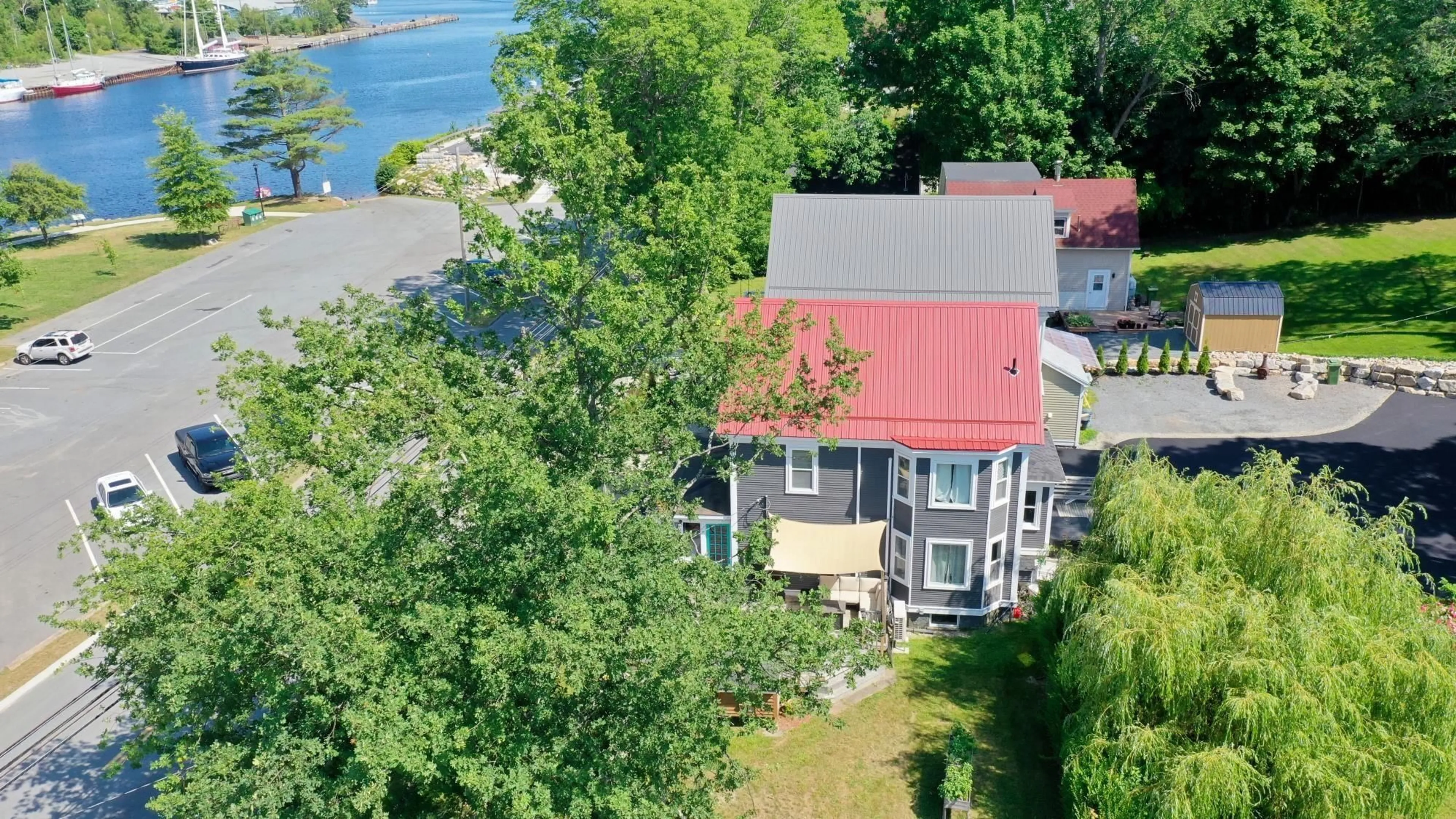 A pic from outside/outdoor area/front of a property/back of a property/a pic from drone, water/lake/river/ocean view for 185 King St, Bridgewater Nova Scotia B4V 1A5