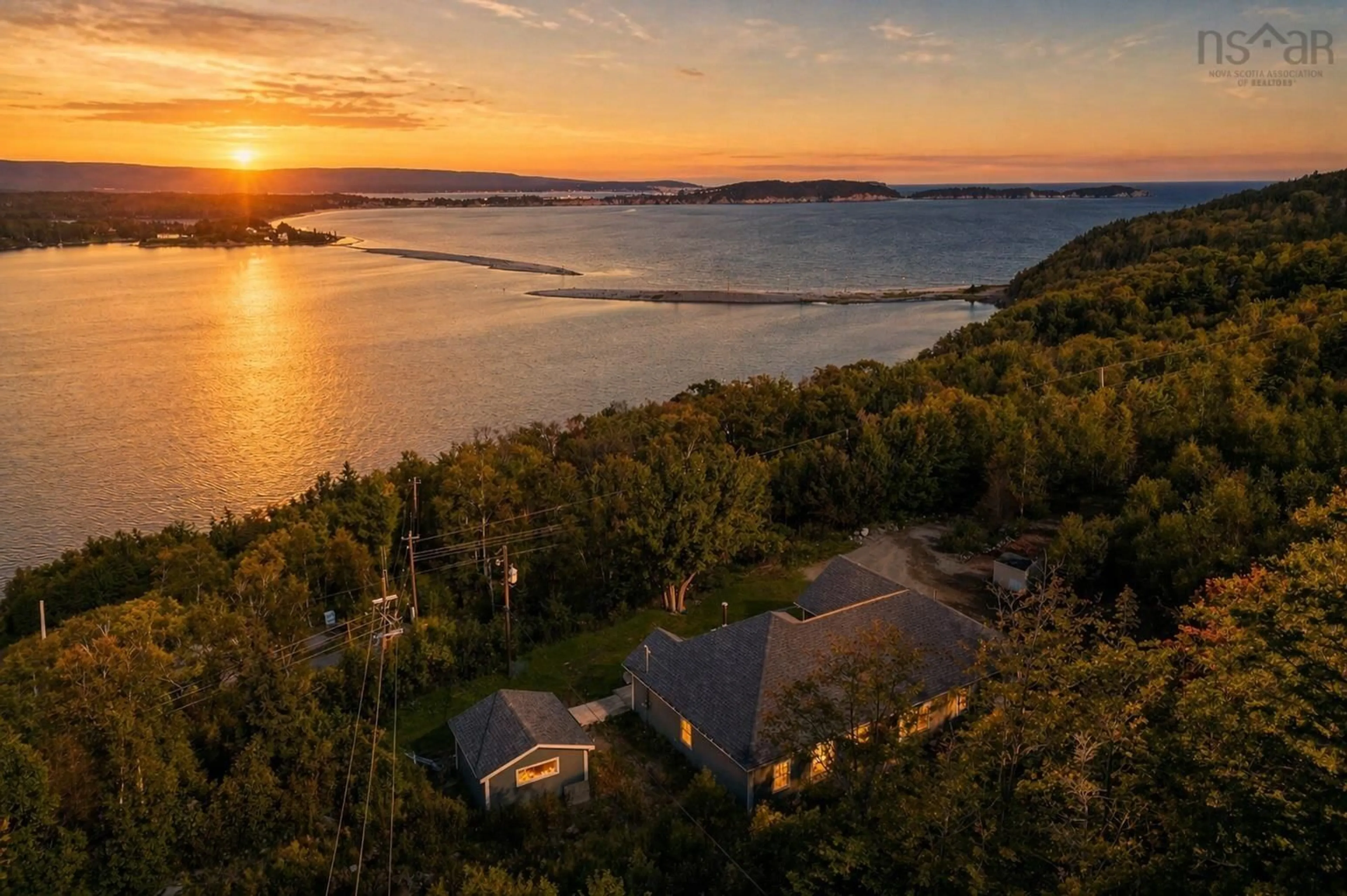 A pic from outside/outdoor area/front of a property/back of a property/a pic from drone, water/lake/river/ocean view for 39170 Cabot Trail Rd, Ingonish Nova Scotia B0C 1L0