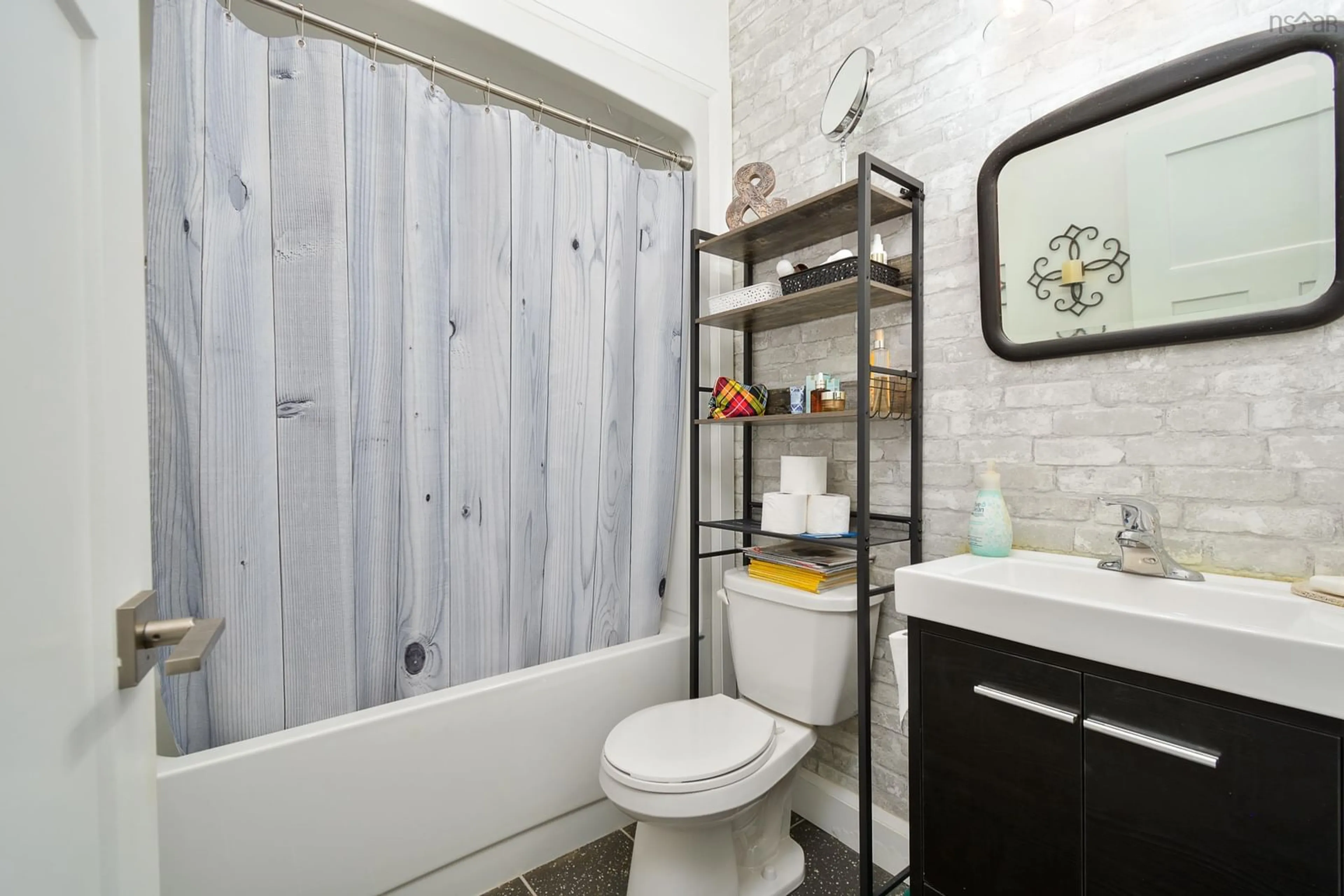 Standard bathroom, ceramic/tile floor for 39170 Cabot Trail Rd, Ingonish Nova Scotia B0C 1L0