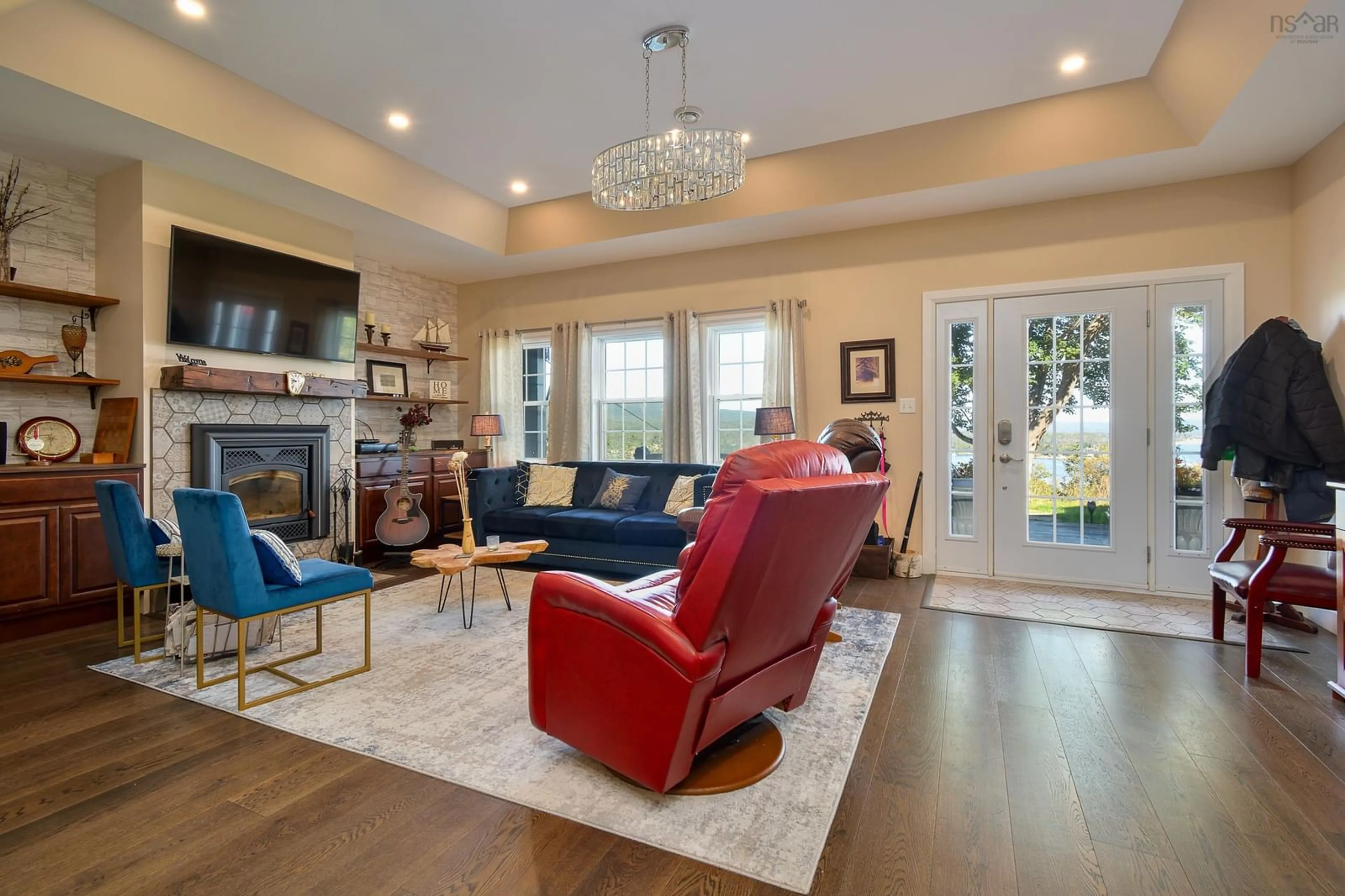 Living room with furniture, unknown for 39170 Cabot Trail Rd, Ingonish Nova Scotia B0C 1L0