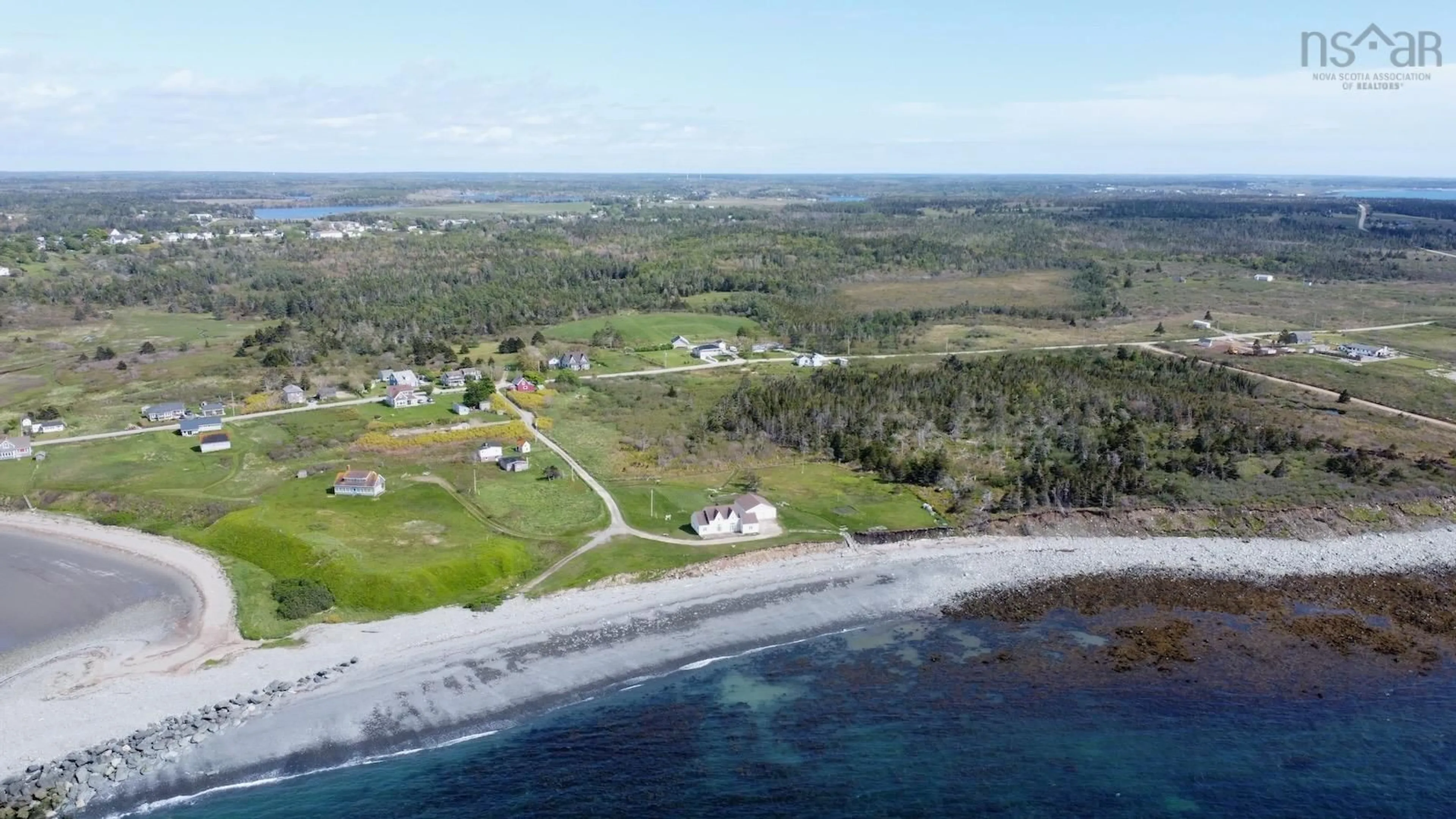 A pic from outside/outdoor area/front of a property/back of a property/a pic from drone, water/lake/river/ocean view for 3160 Main Shore Rd, Port Maitland Nova Scotia B5A 5V5