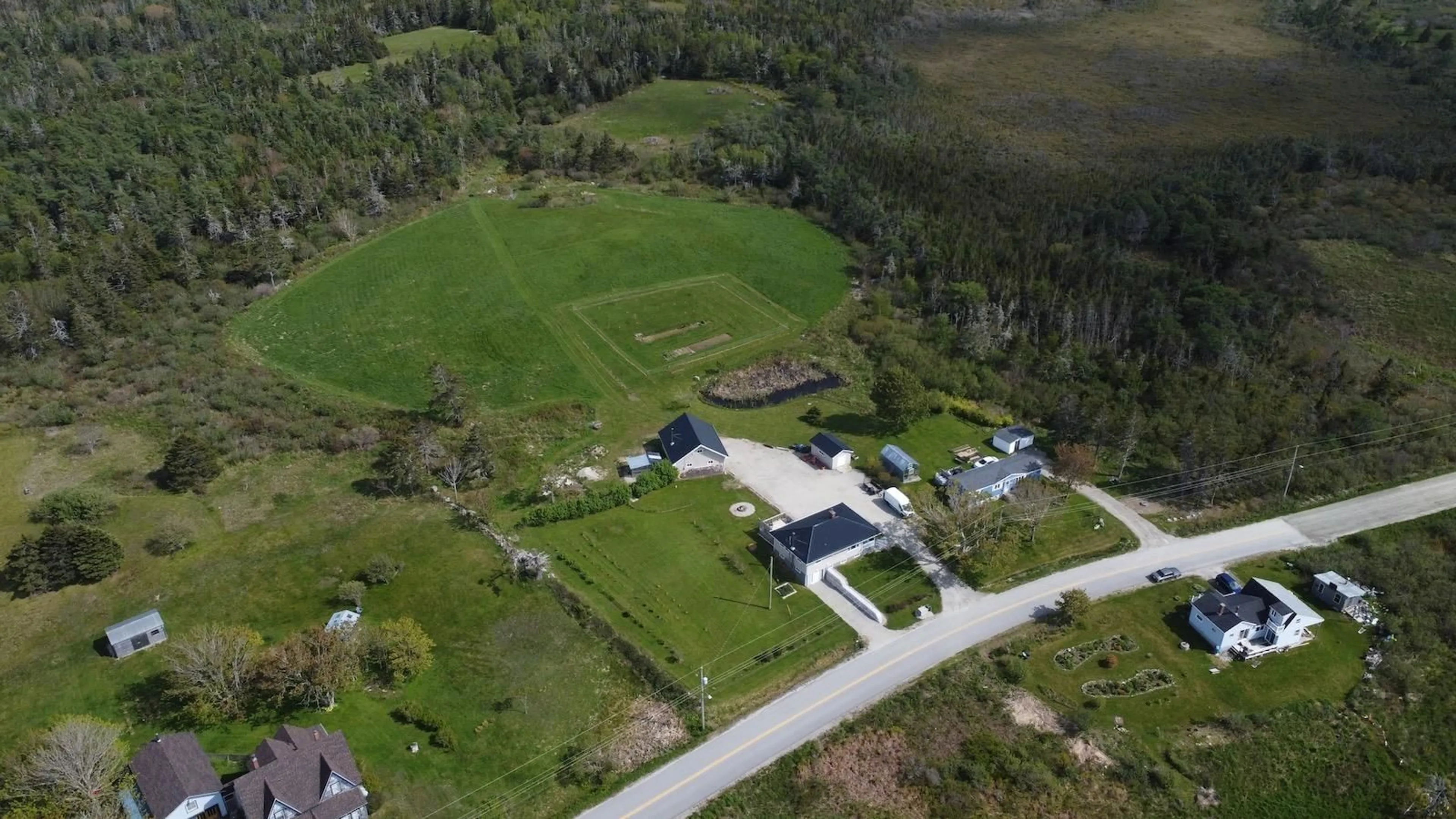A pic from outside/outdoor area/front of a property/back of a property/a pic from drone, street for 3160 Main Shore Rd, Port Maitland Nova Scotia B5A 5V5