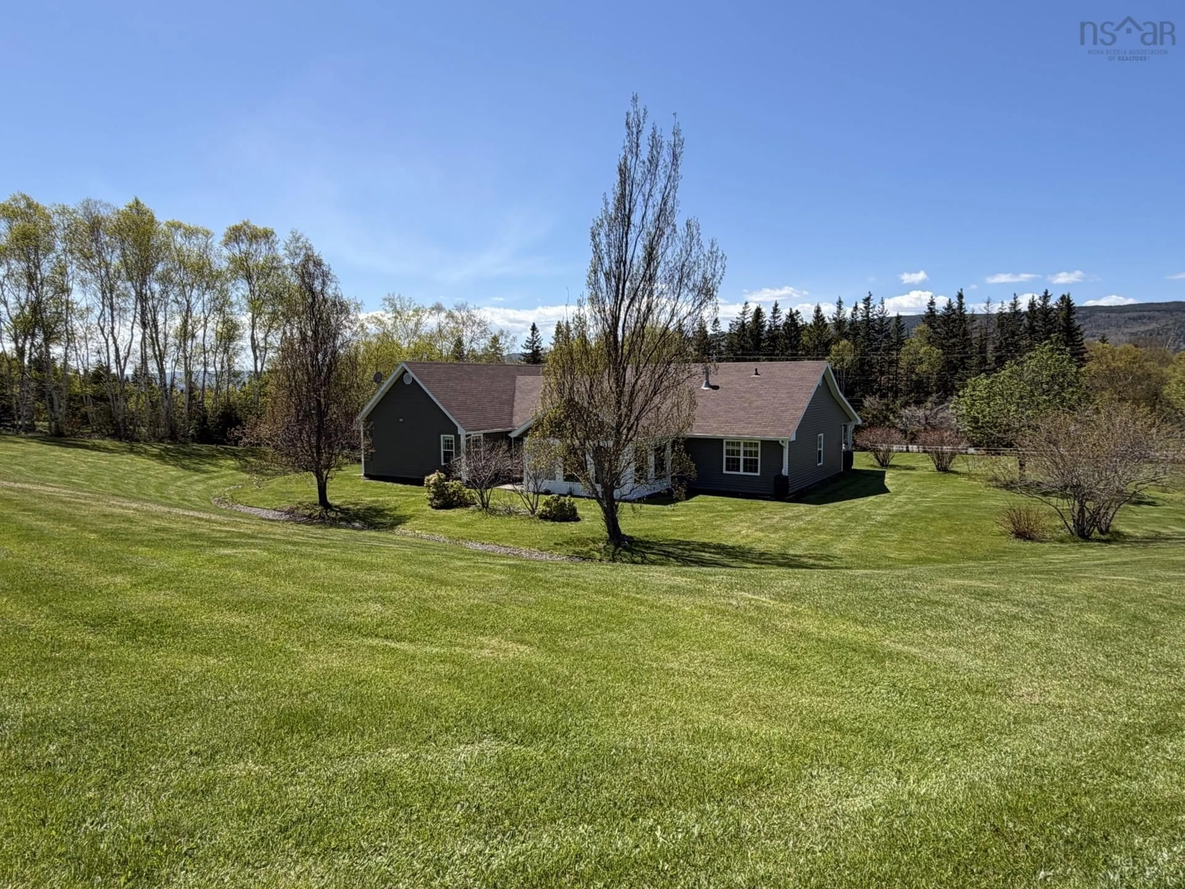 A pic from outside/outdoor area/front of a property/back of a property/a pic from drone, unknown for 1937 Old Route 5, Big Bras D'Or Nova Scotia B1X 1G7
