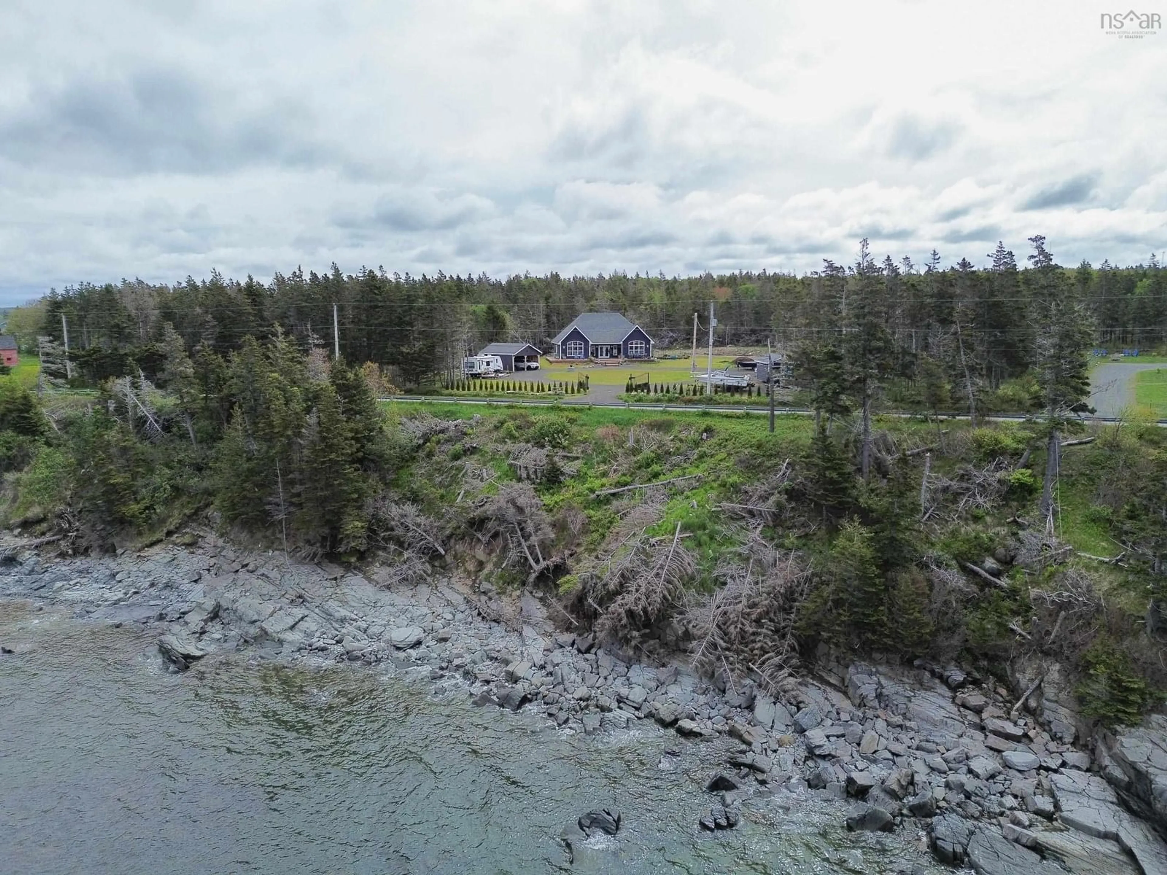 A pic from outside/outdoor area/front of a property/back of a property/a pic from drone, water/lake/river/ocean view for 684 Riverside Rd, New Edinburgh Nova Scotia B0W 3T0