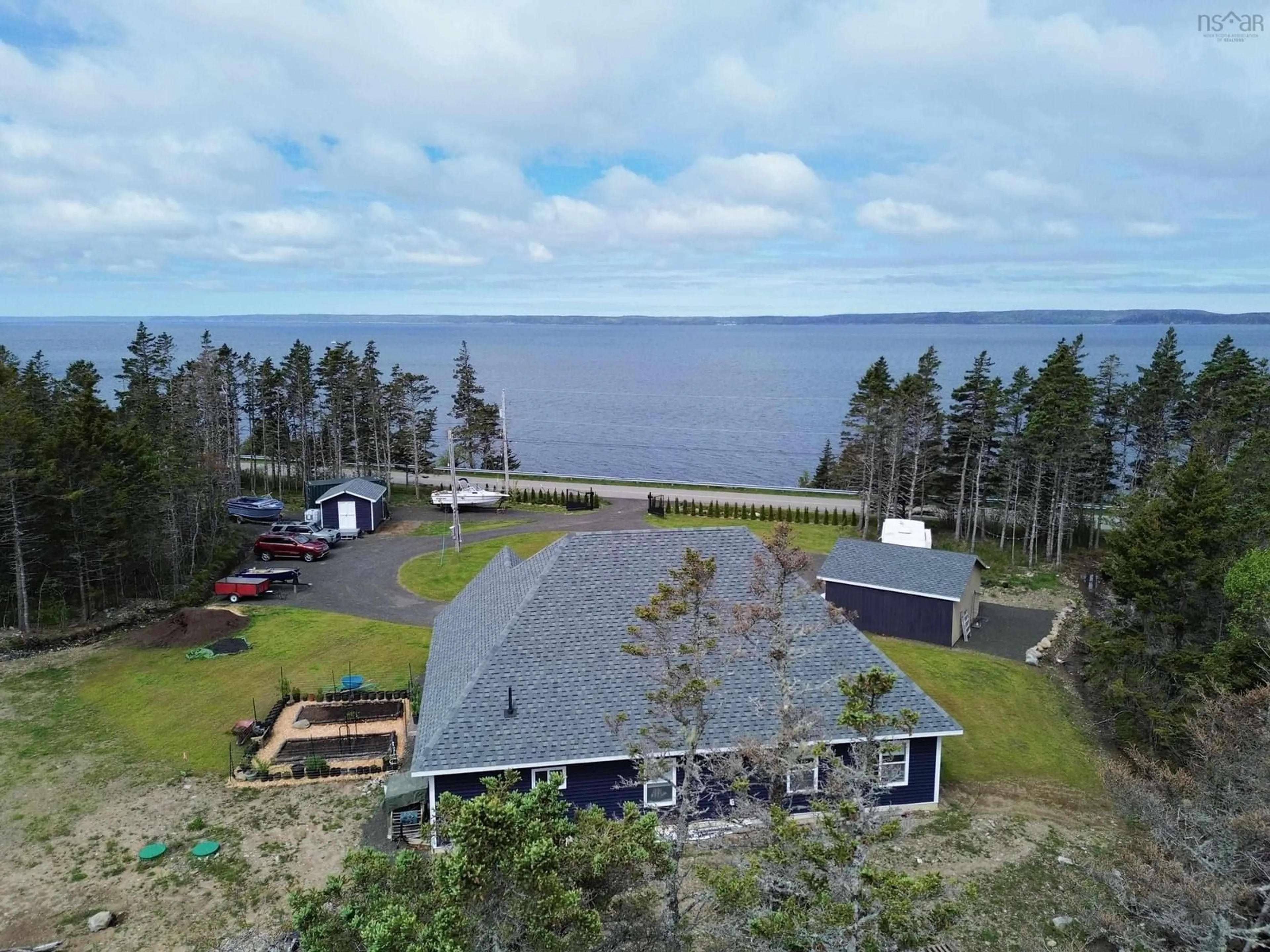 A pic from outside/outdoor area/front of a property/back of a property/a pic from drone, water/lake/river/ocean view for 684 Riverside Rd, New Edinburgh Nova Scotia B0W 3T0