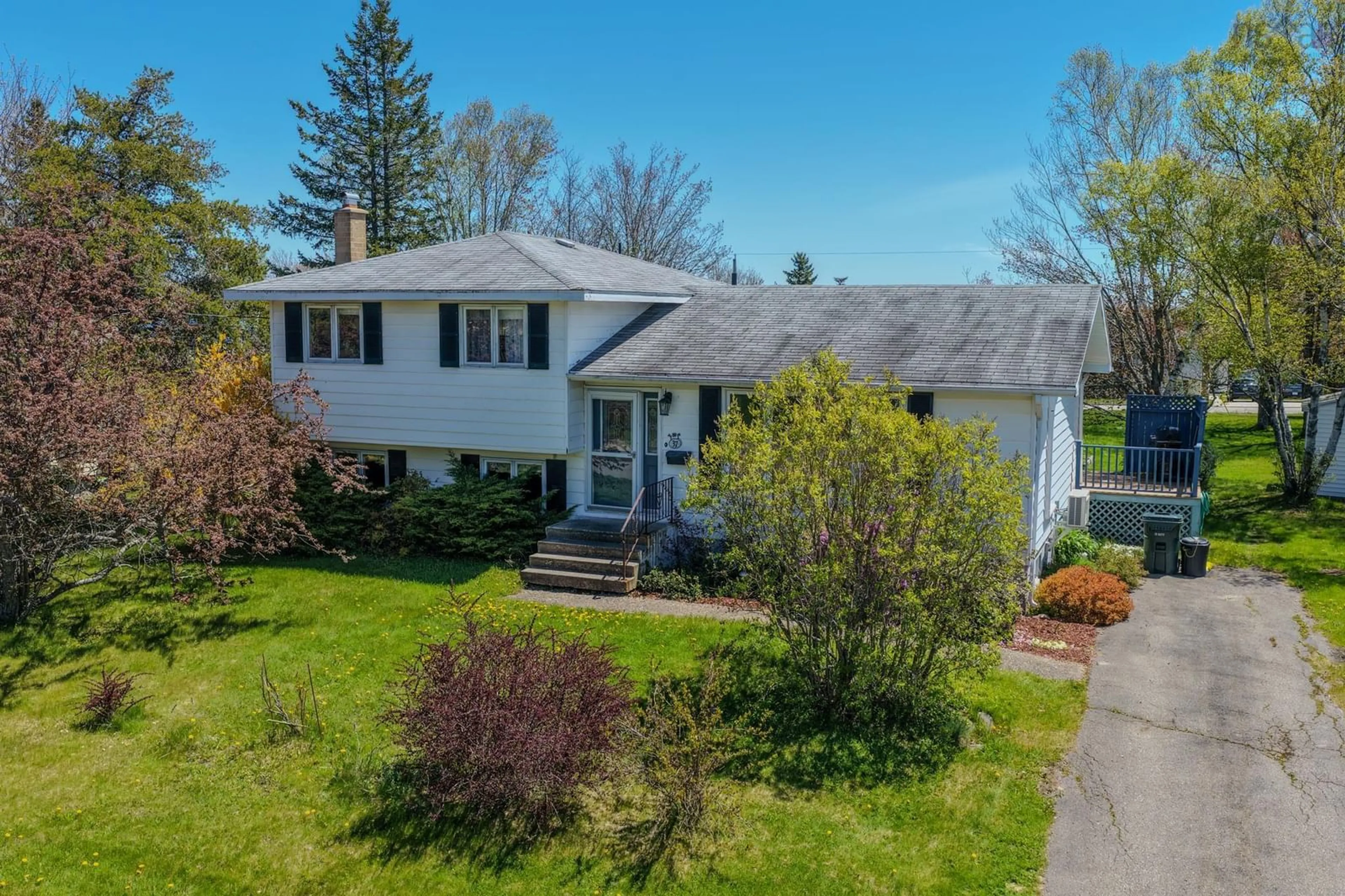 A pic from outside/outdoor area/front of a property/back of a property/a pic from drone, street for 37 Collier Ave, Coxheath Nova Scotia B1R 2H5
