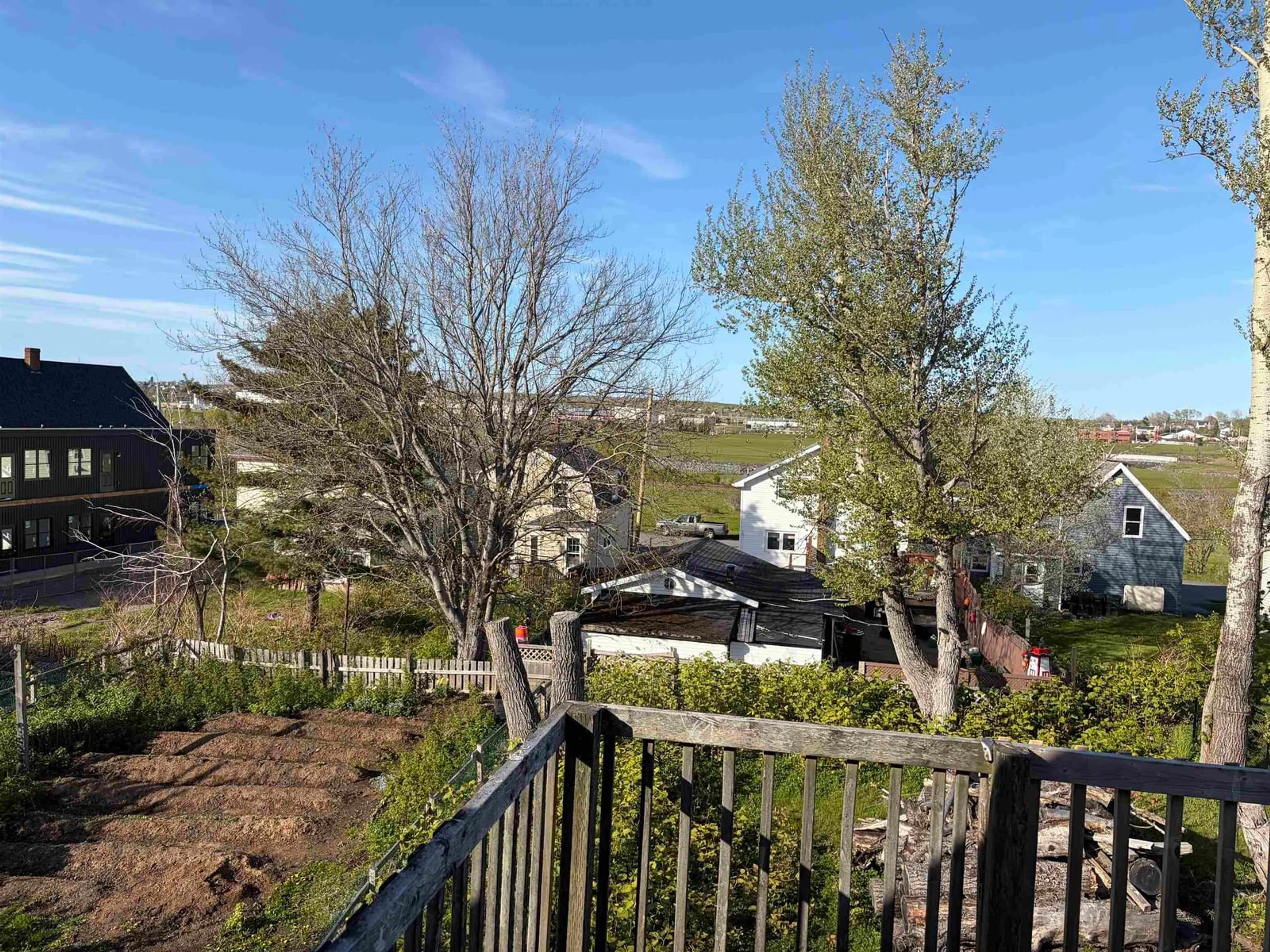 A pic from outside/outdoor area/front of a property/back of a property/a pic from drone, water/lake/river/ocean view for 63 Dolbin St, Sydney Nova Scotia B1P 1S4
