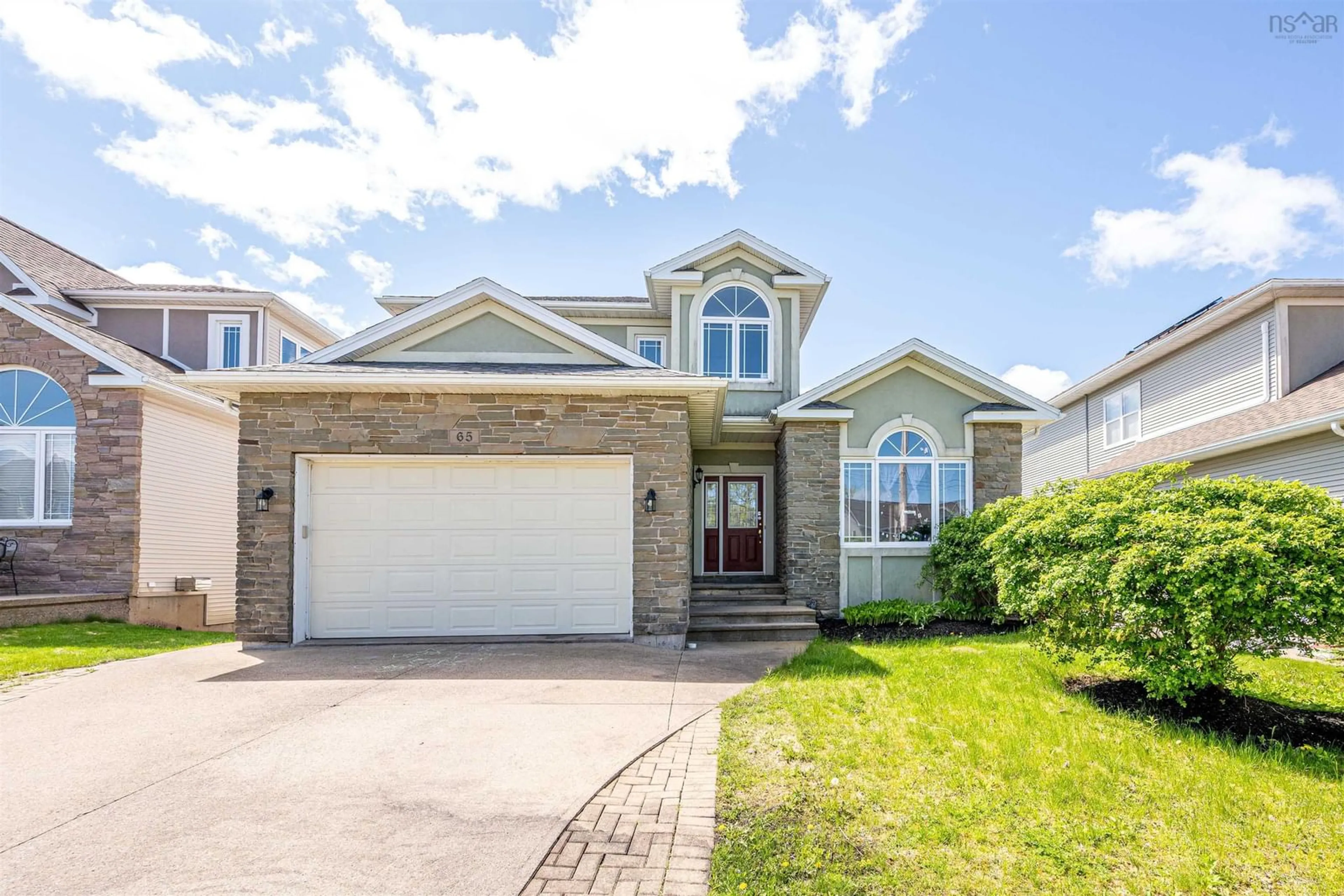 Home with vinyl exterior material, street for 65 Stone Gate Dr, Halifax Nova Scotia B3N 3J3