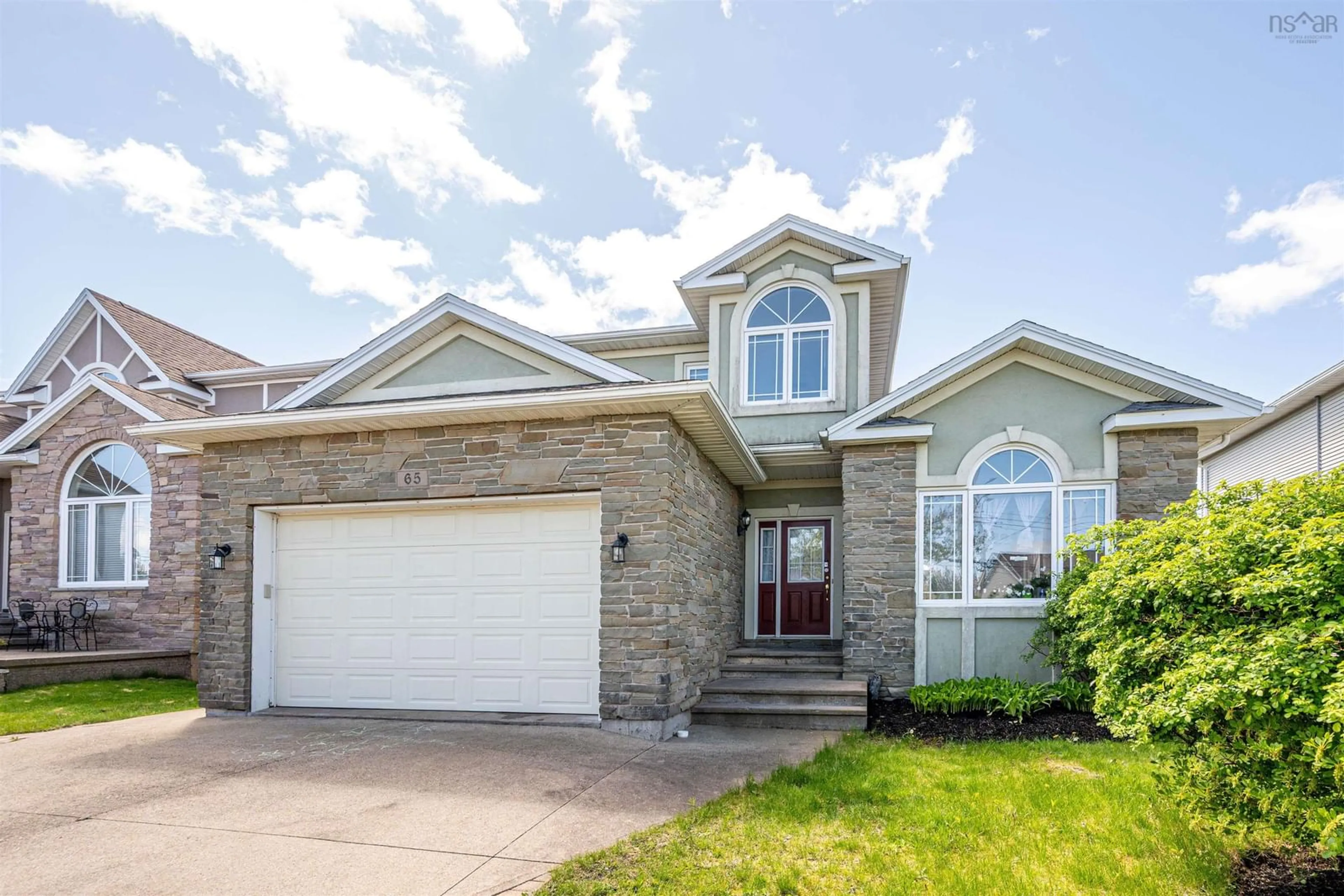 Home with vinyl exterior material, street for 65 Stone Gate Dr, Halifax Nova Scotia B3N 3J3