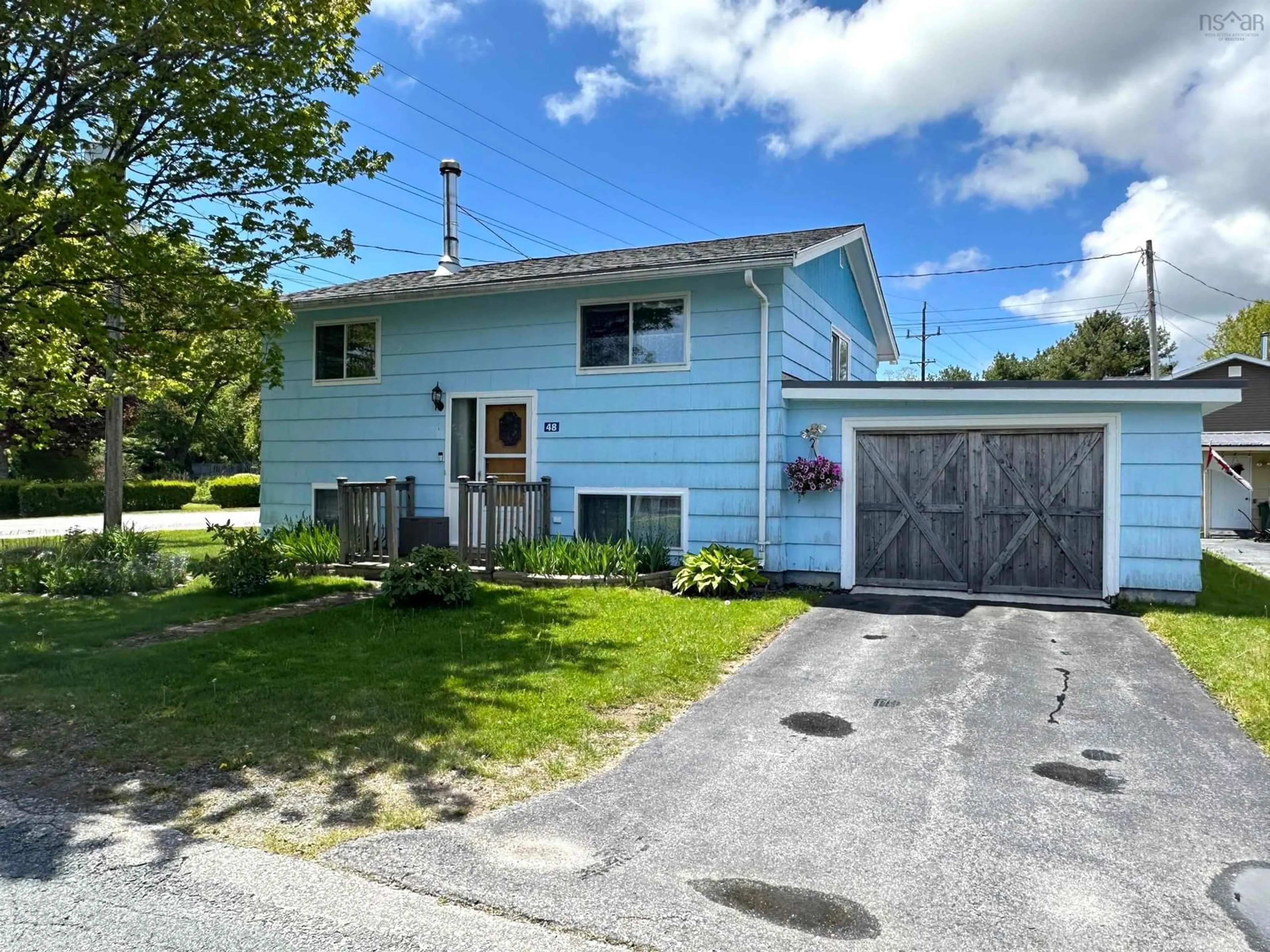 A pic from outside/outdoor area/front of a property/back of a property/a pic from drone, street for 48 Zwicker Ave, Liverpool Nova Scotia B0T 1K0