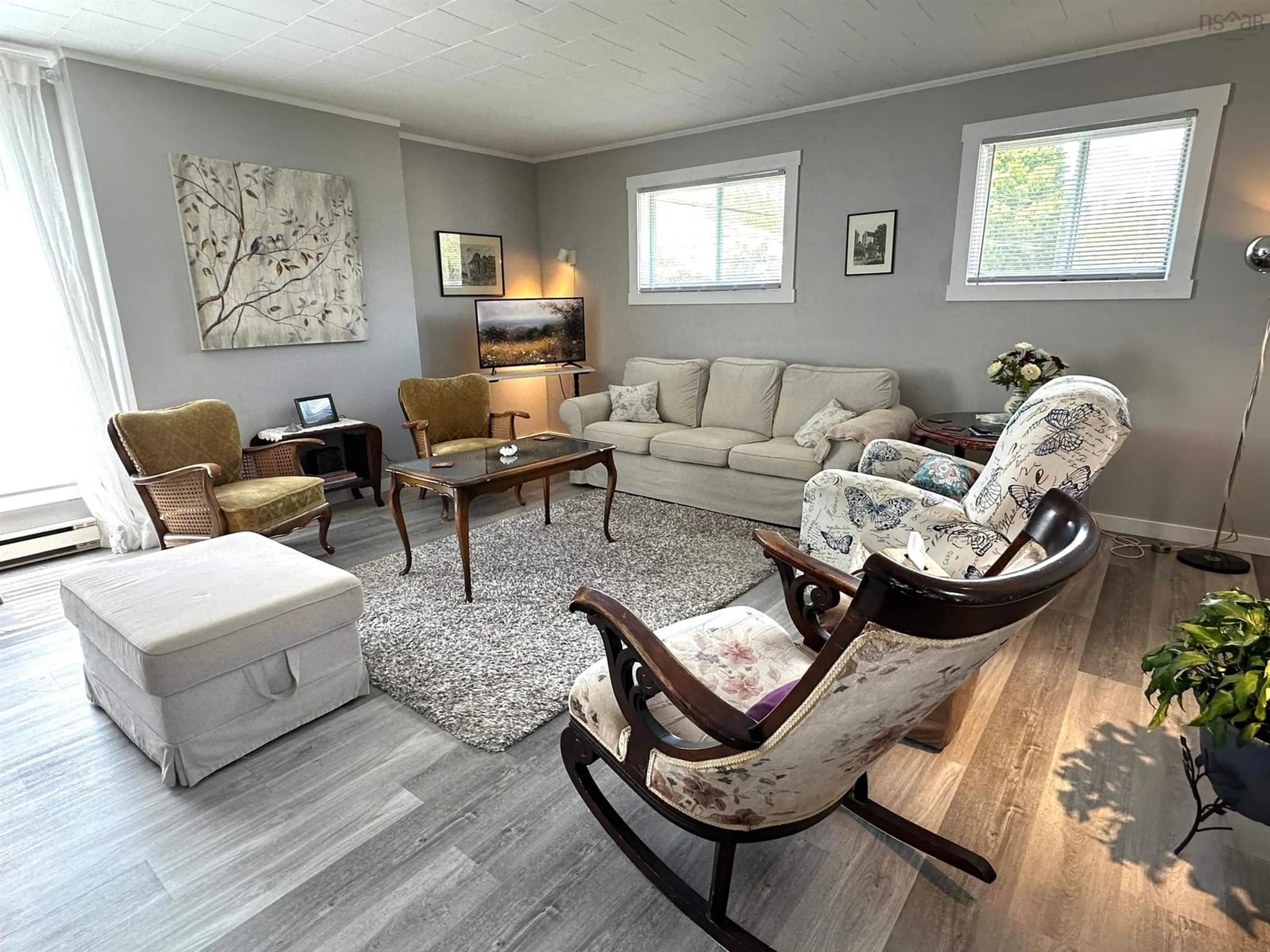 Living room with furniture, wood/laminate floor for 48 Zwicker Ave, Liverpool Nova Scotia B0T 1K0