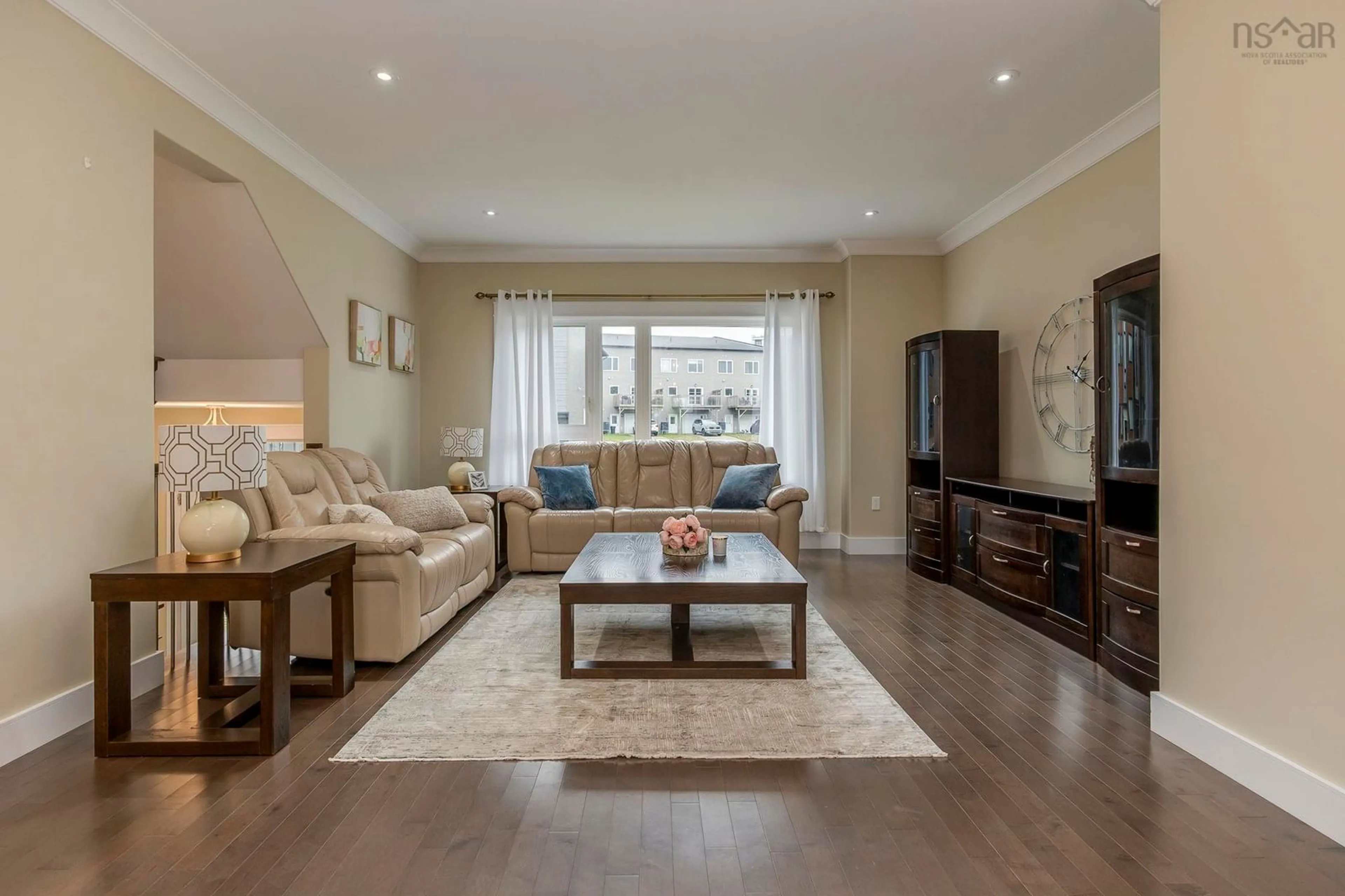 Living room with furniture, wood/laminate floor for 117 Eliza Ritchie Cres, Halifax Nova Scotia B3M 0K5