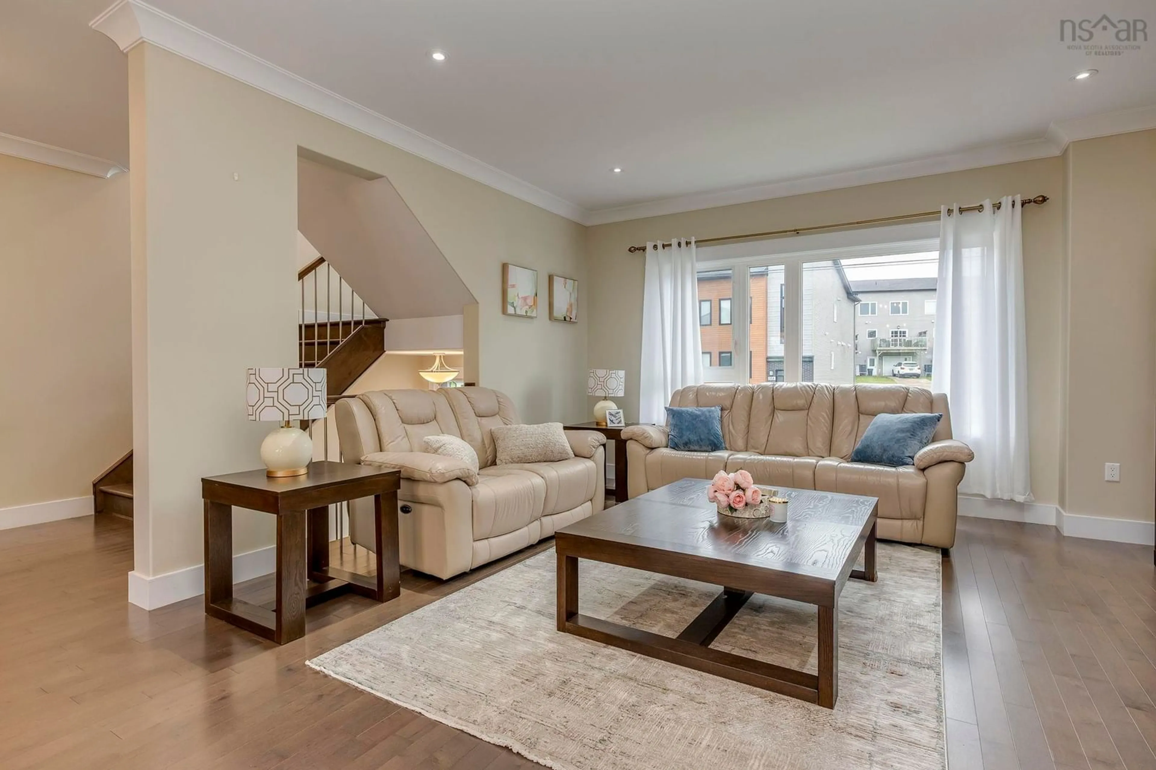 Living room with furniture, wood/laminate floor for 117 Eliza Ritchie Cres, Halifax Nova Scotia B3M 0K5
