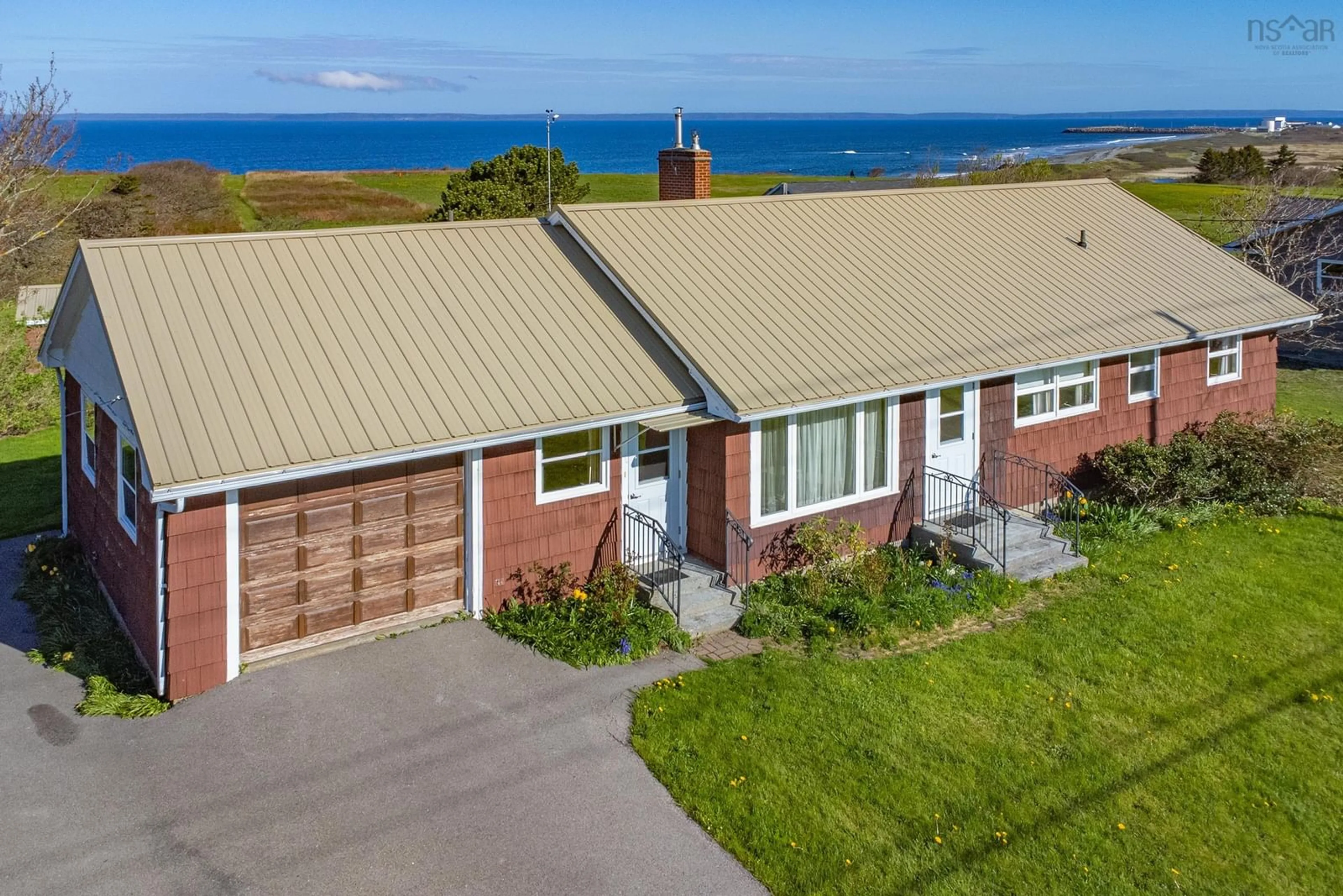 A pic from outside/outdoor area/front of a property/back of a property/a pic from drone, water/lake/river/ocean view for 9735 Highway 1, Lower Saulnierville Nova Scotia B0W 2Z0
