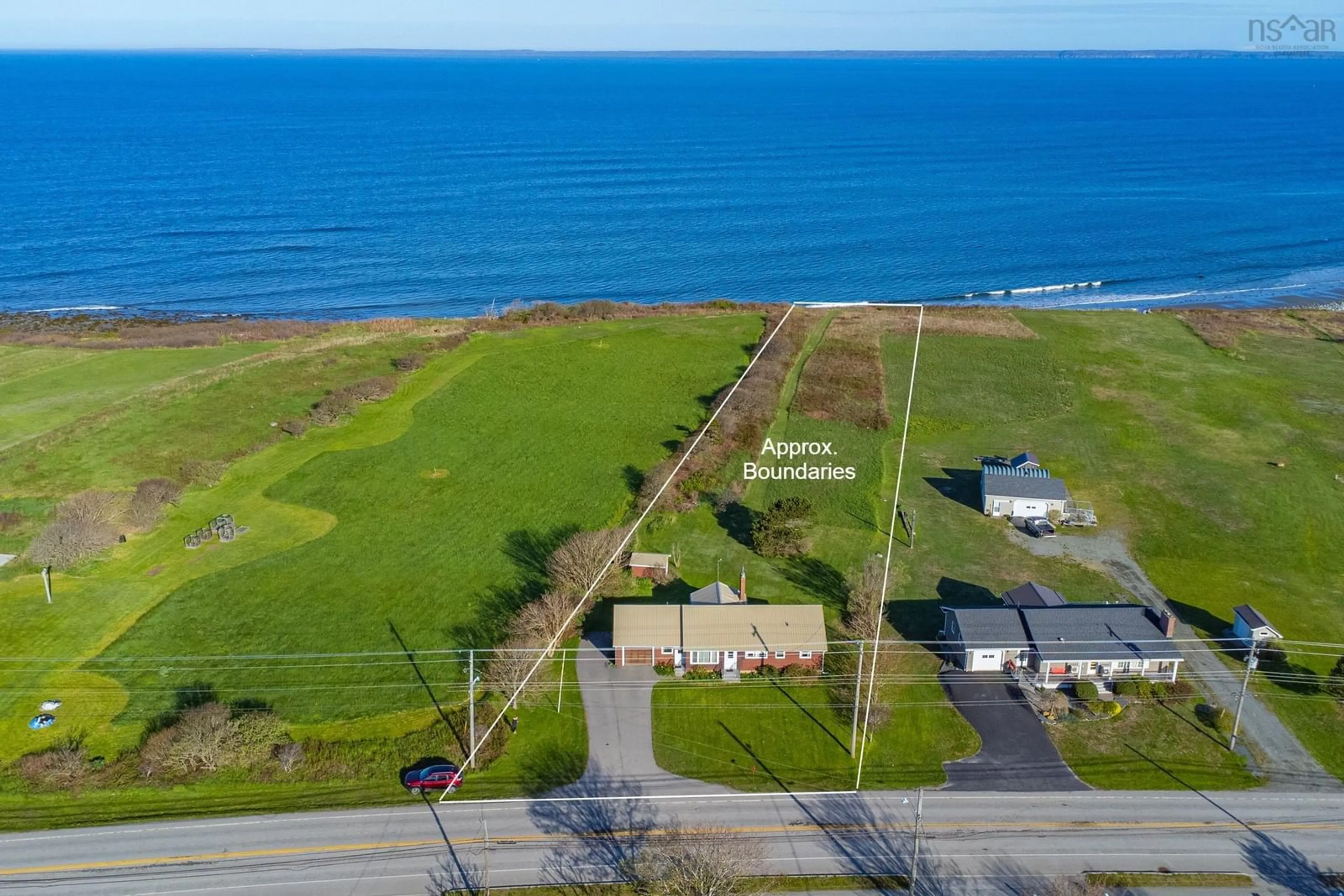 A pic from outside/outdoor area/front of a property/back of a property/a pic from drone, water/lake/river/ocean view for 9735 Highway 1, Lower Saulnierville Nova Scotia B0W 2Z0