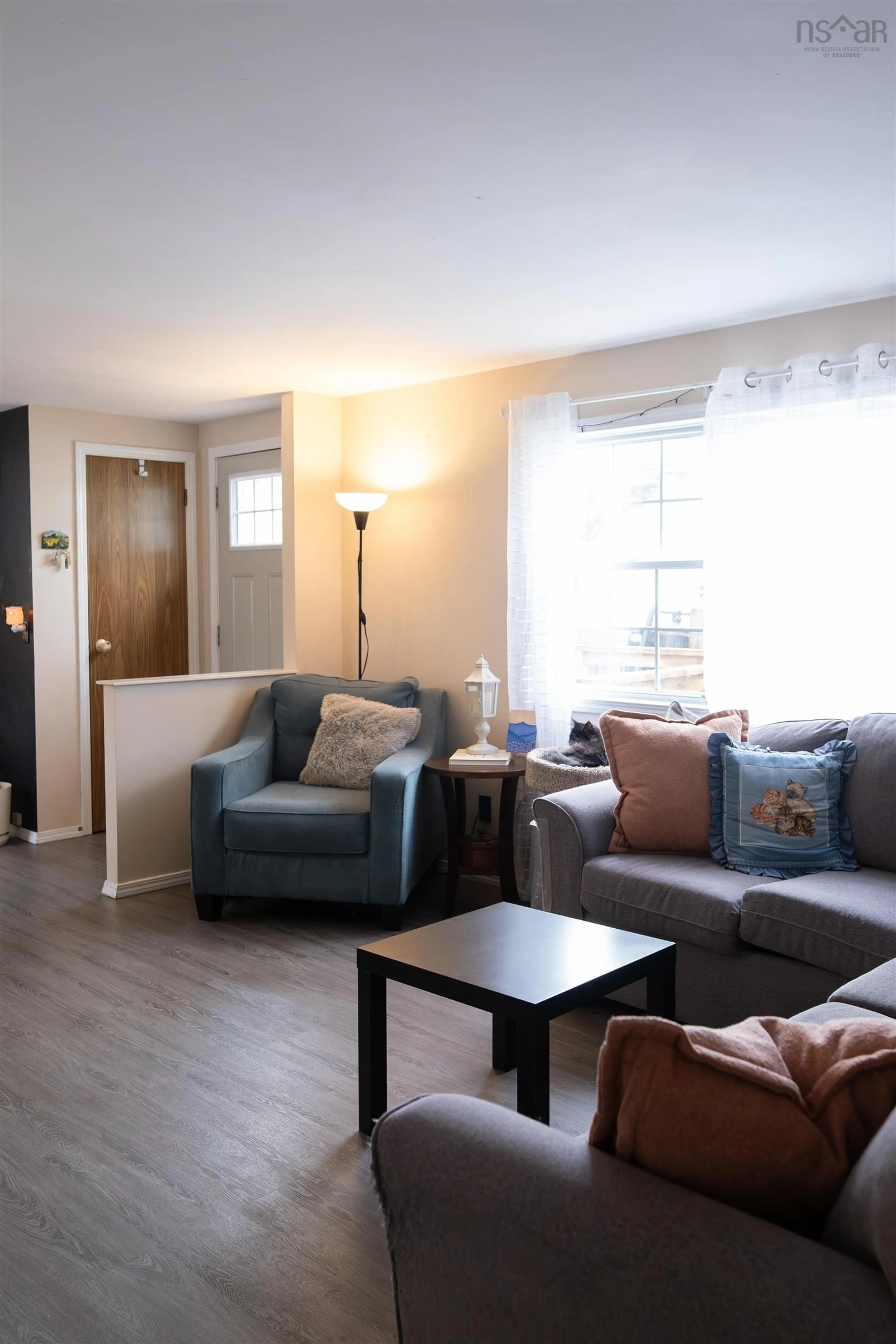 Living room with furniture, wood/laminate floor for 275 Circle Dr, Lake Echo Nova Scotia B3E 1C1