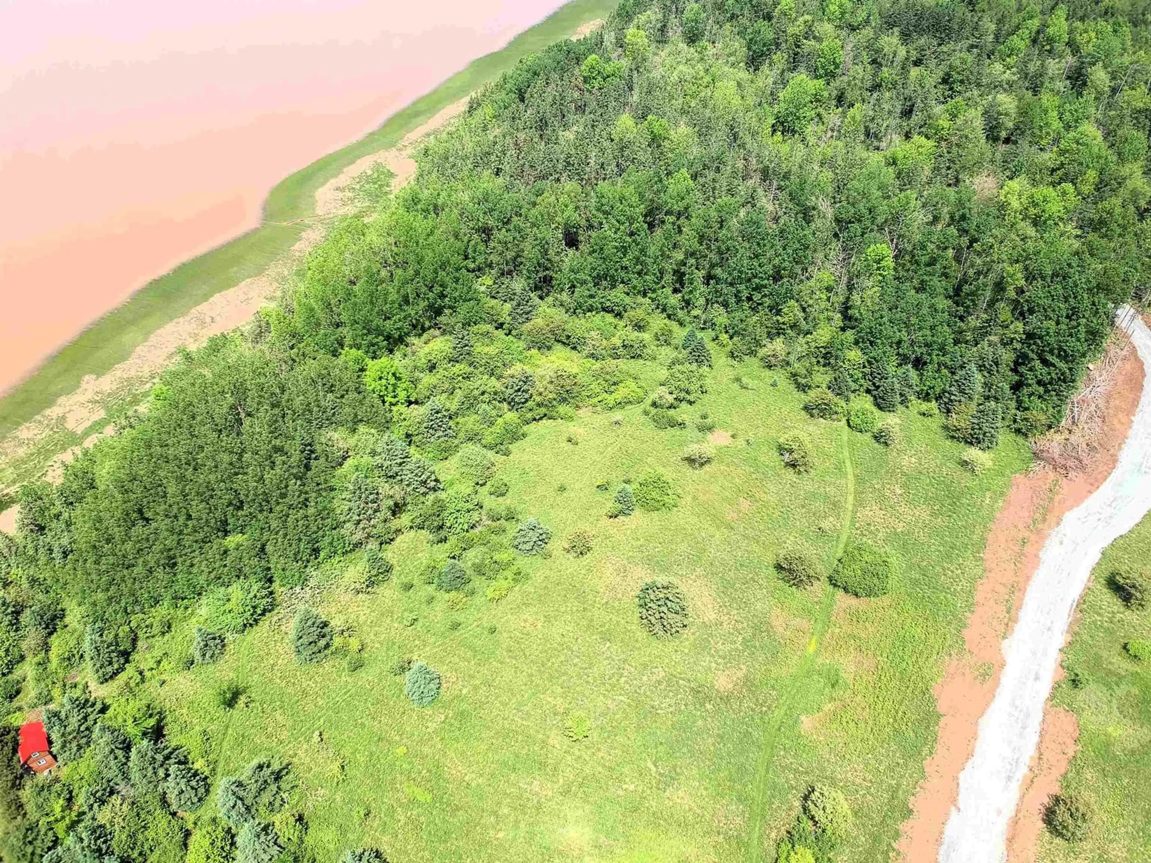 A pic from outside/outdoor area/front of a property/back of a property/a pic from drone, forest/trees view for Avon Spirit Lane #1, Avondale Nova Scotia B0N 2A0