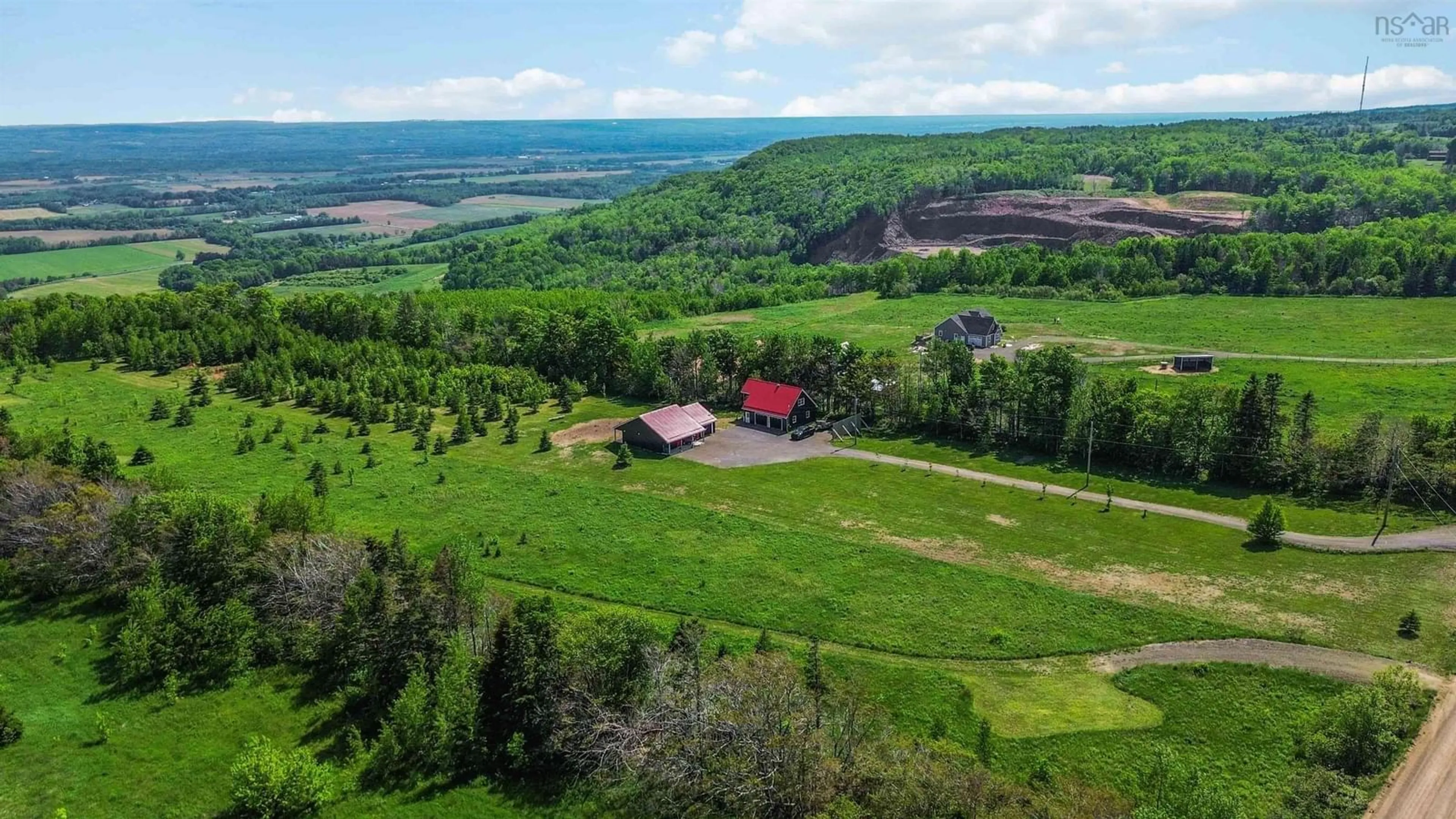 A pic from outside/outdoor area/front of a property/back of a property/a pic from drone, mountain view for 1874 Brow Of Mountain Rd, Viewmount Nova Scotia B0P 1E0