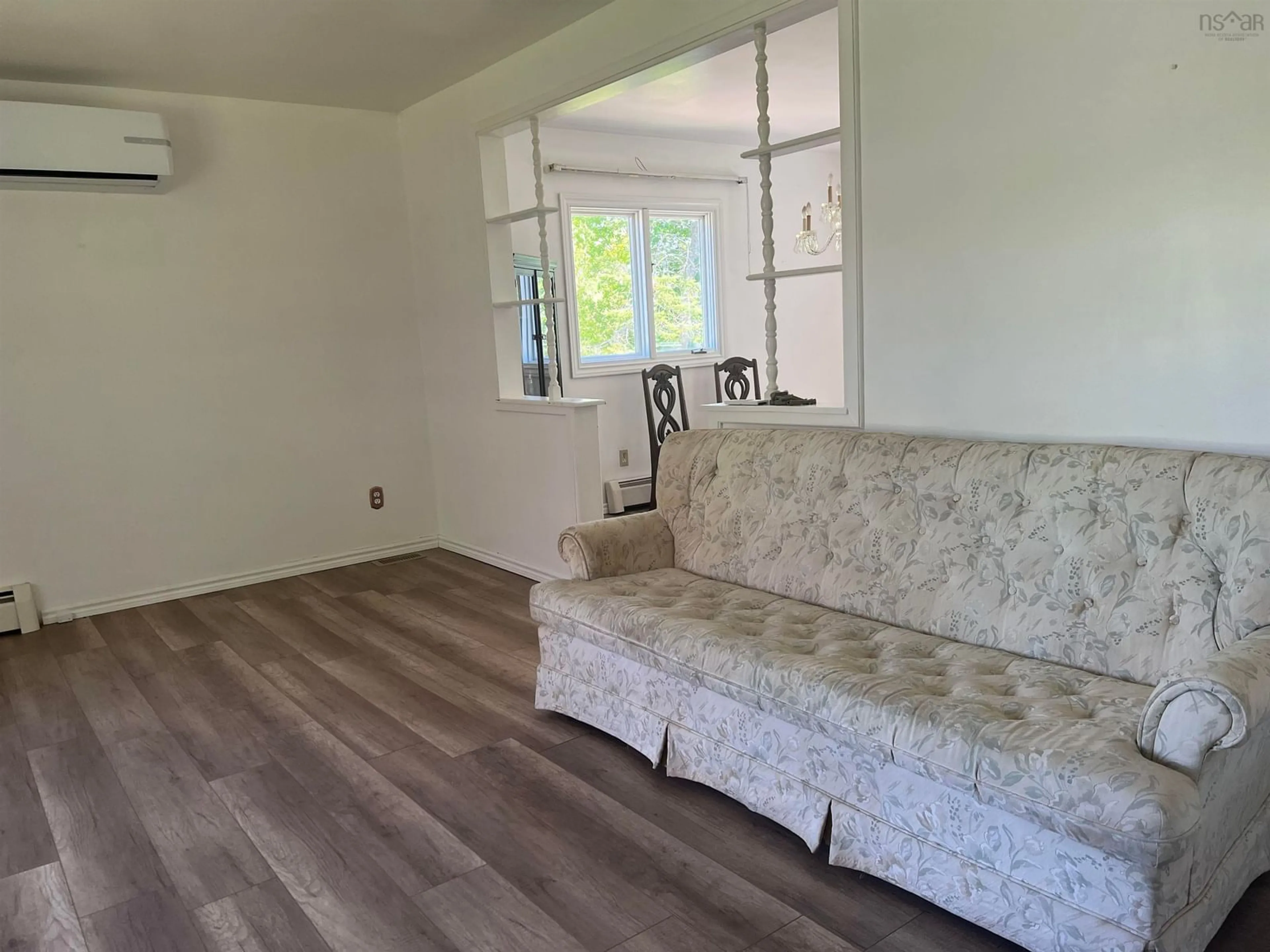 Living room with furniture, wood/laminate floor for 160 Brown St, Berwick Nova Scotia B0P 1E0