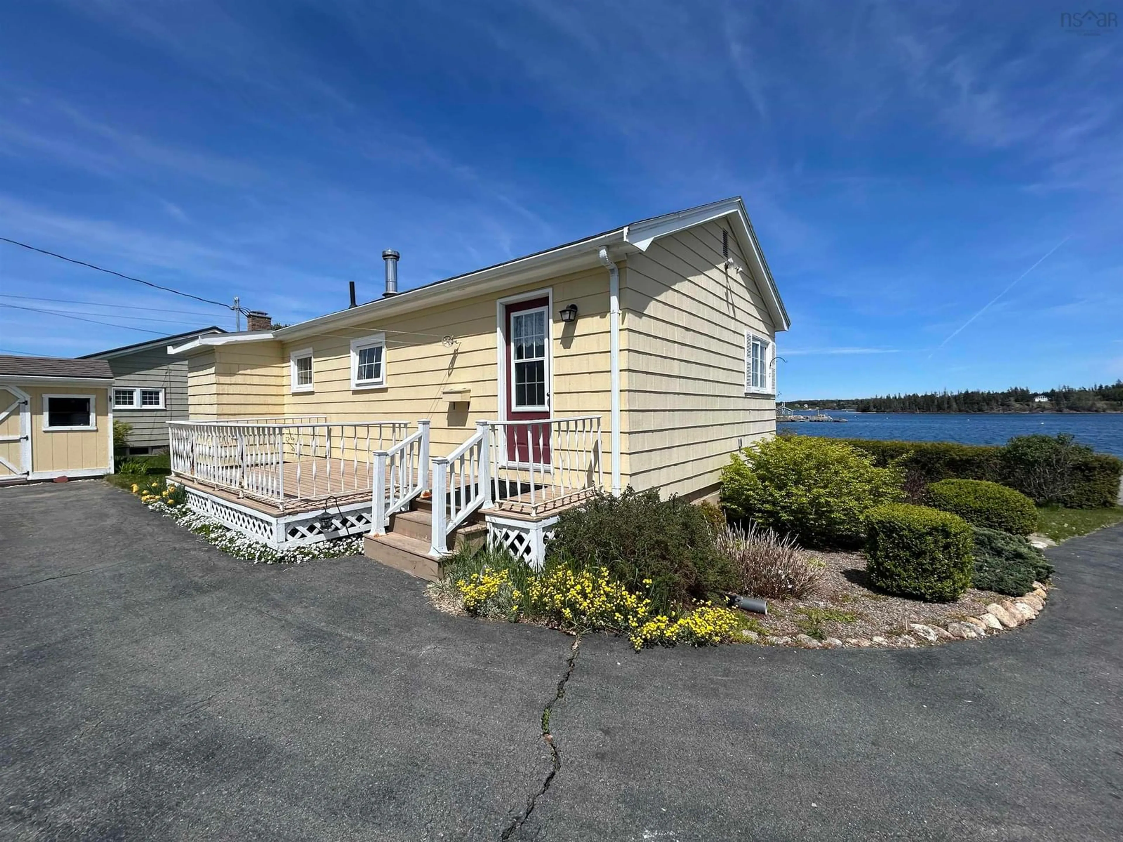 A pic from outside/outdoor area/front of a property/back of a property/a pic from drone, water/lake/river/ocean view for 698 Oakland Rd, Indian Point Nova Scotia B0J 2E0