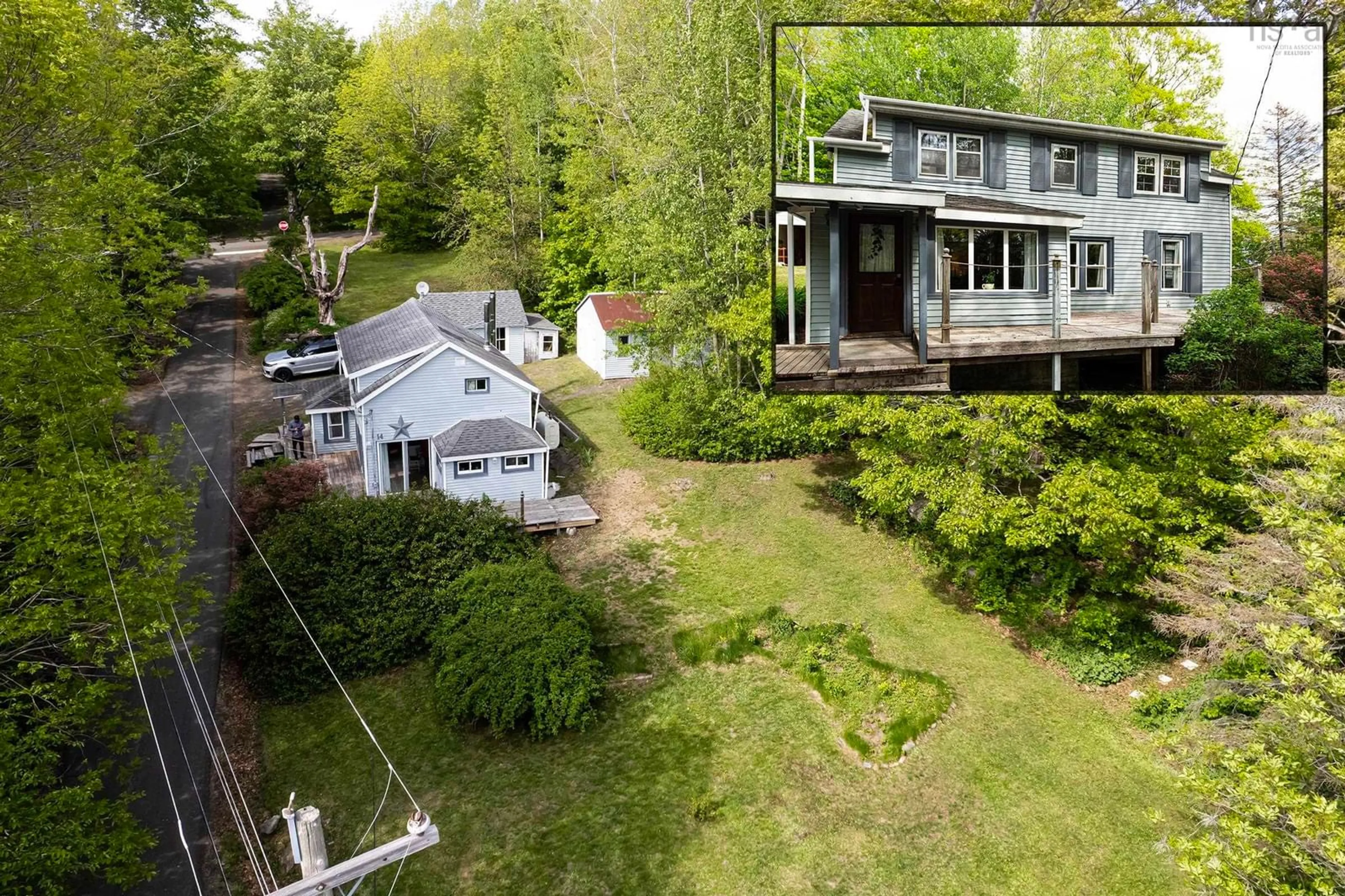 A pic from outside/outdoor area/front of a property/back of a property/a pic from drone, water/lake/river/ocean view for 14 Cross St, Bear River Nova Scotia B0S 1B0