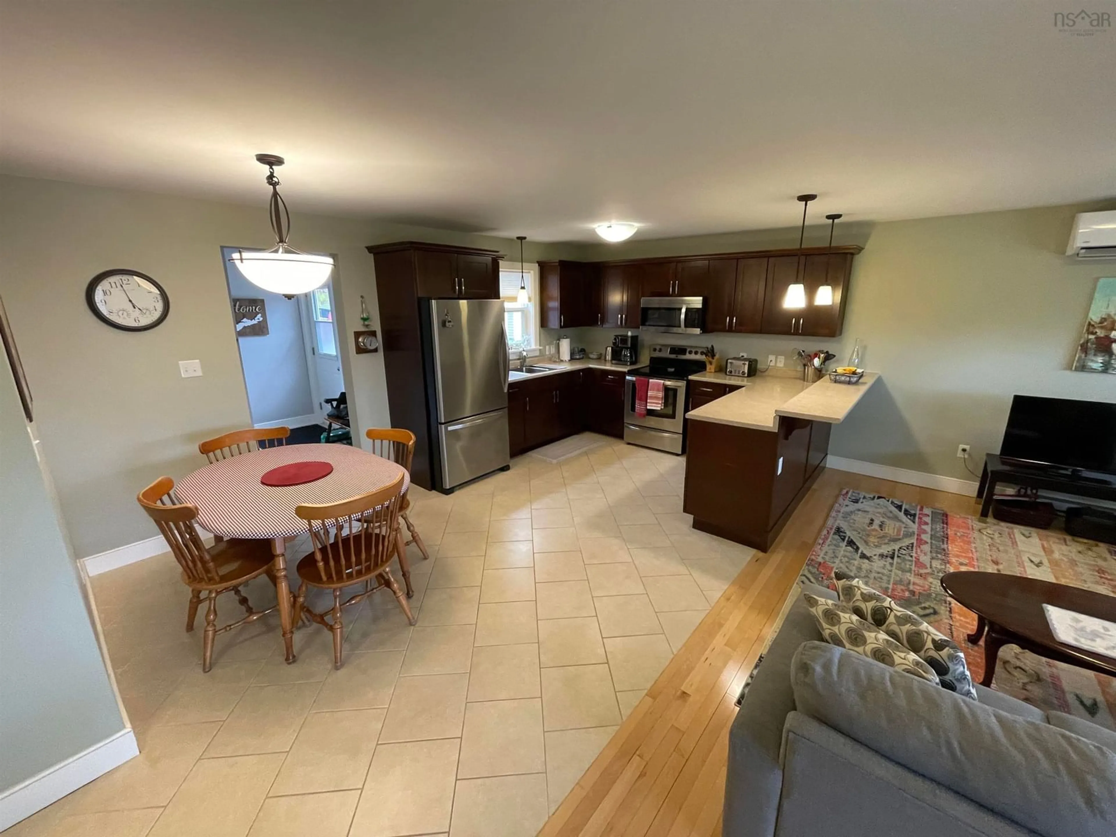 Open concept kitchen, ceramic/tile floor for 11599 Kempt Head Rd, Boularderie Centre Nova Scotia B1X 1K6