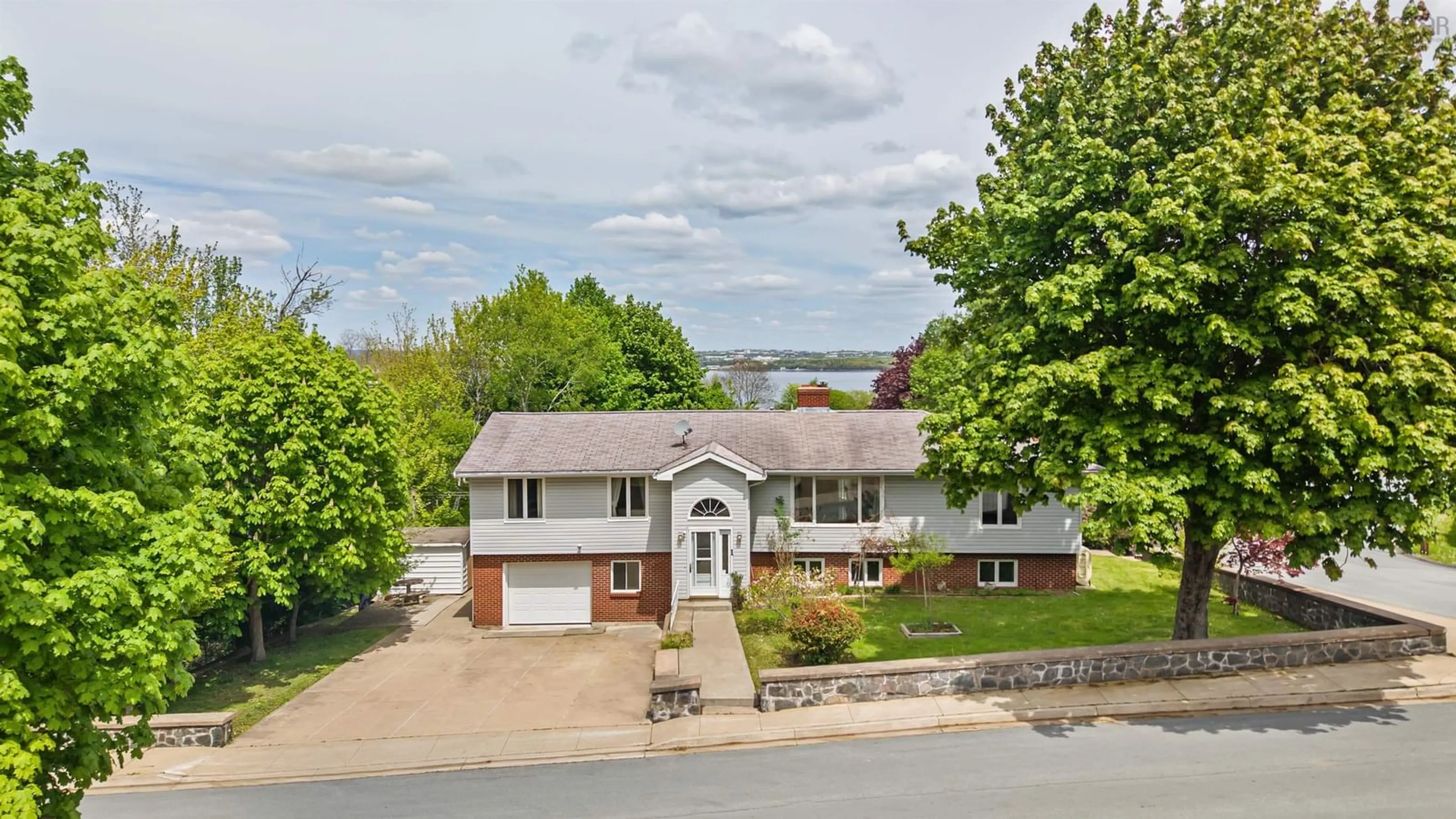 A pic from outside/outdoor area/front of a property/back of a property/a pic from drone, unknown for 1 Wren St, Halifax Nova Scotia B3M 2R1