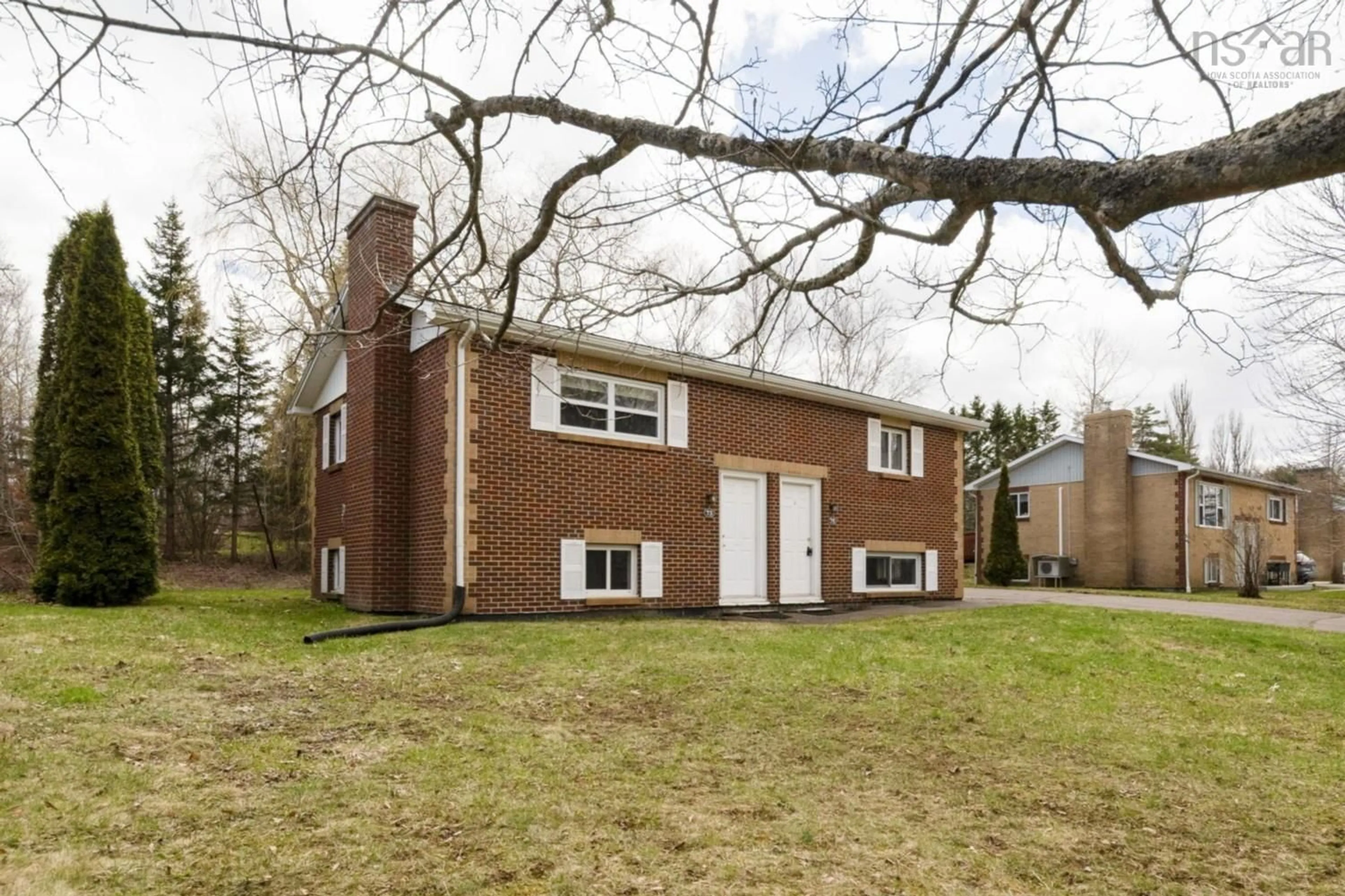Home with brick exterior material, street for 73/75 Pleasant St, Wolfville Nova Scotia B4P 2R7