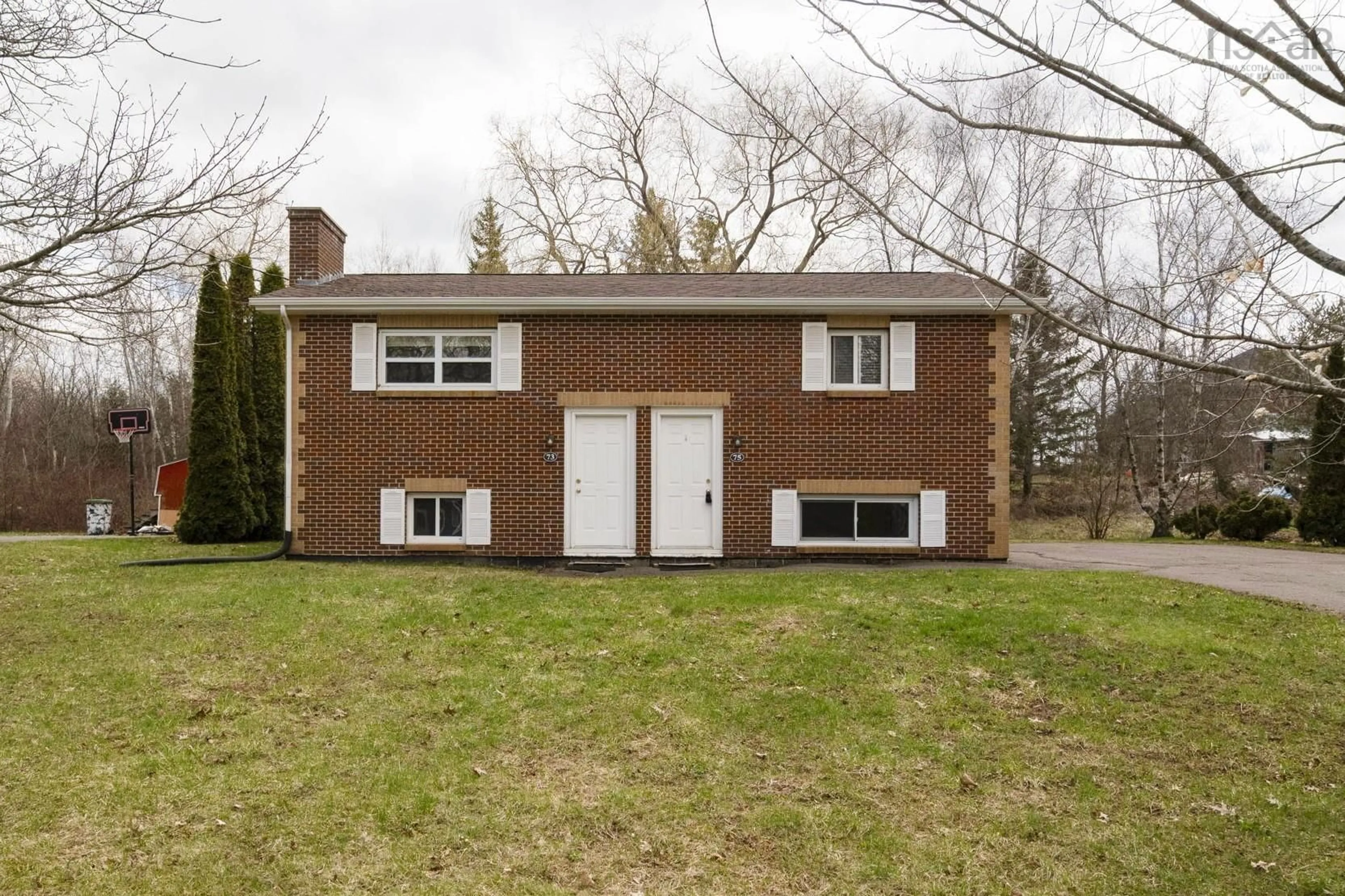 Home with vinyl exterior material, street for 73/75 Pleasant St, Wolfville Nova Scotia B4P 2R7