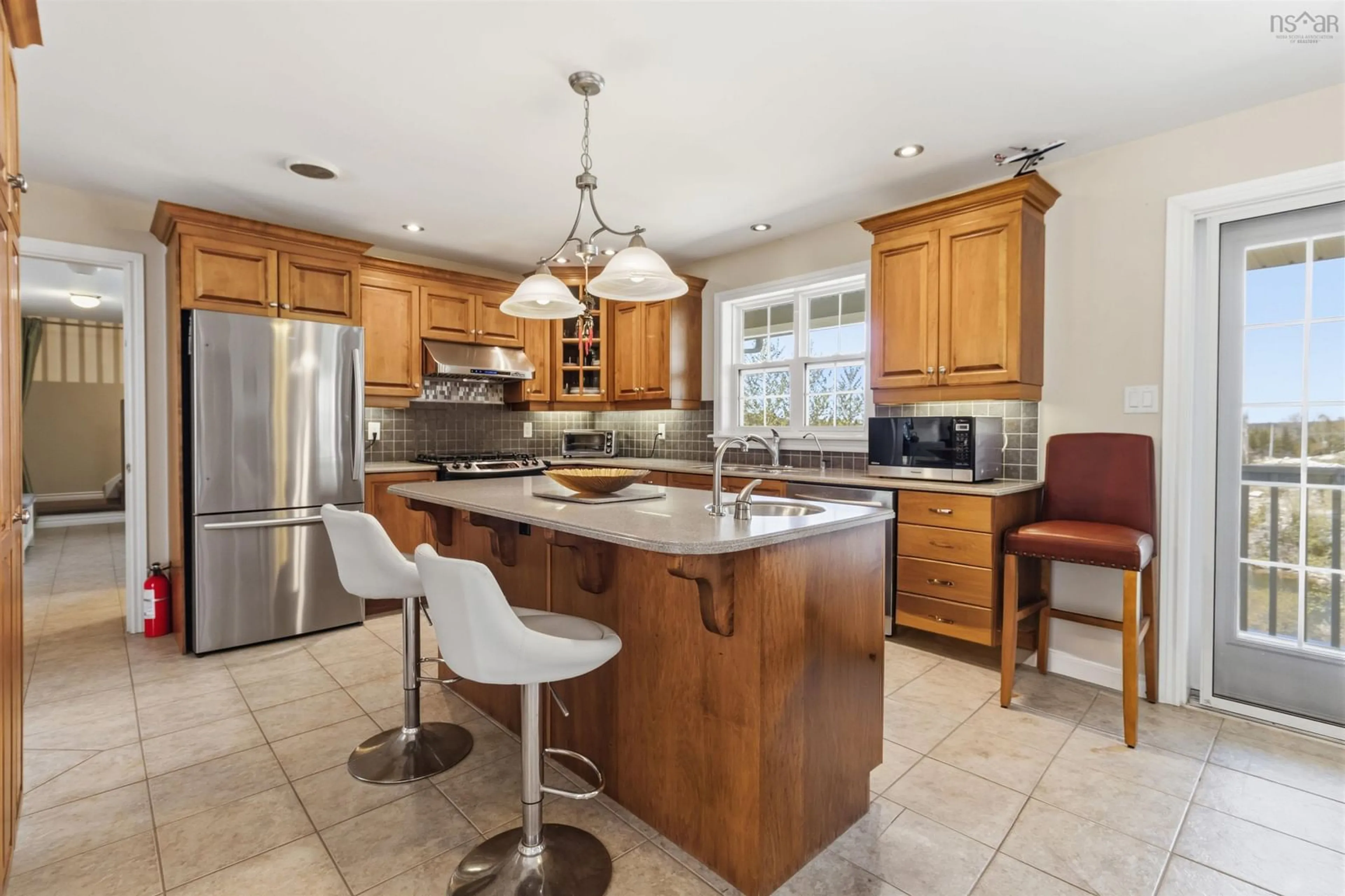 Open concept kitchen, ceramic/tile floor for 17 Paddys Head Road, Indian Harbour Nova Scotia B3Z 3X4