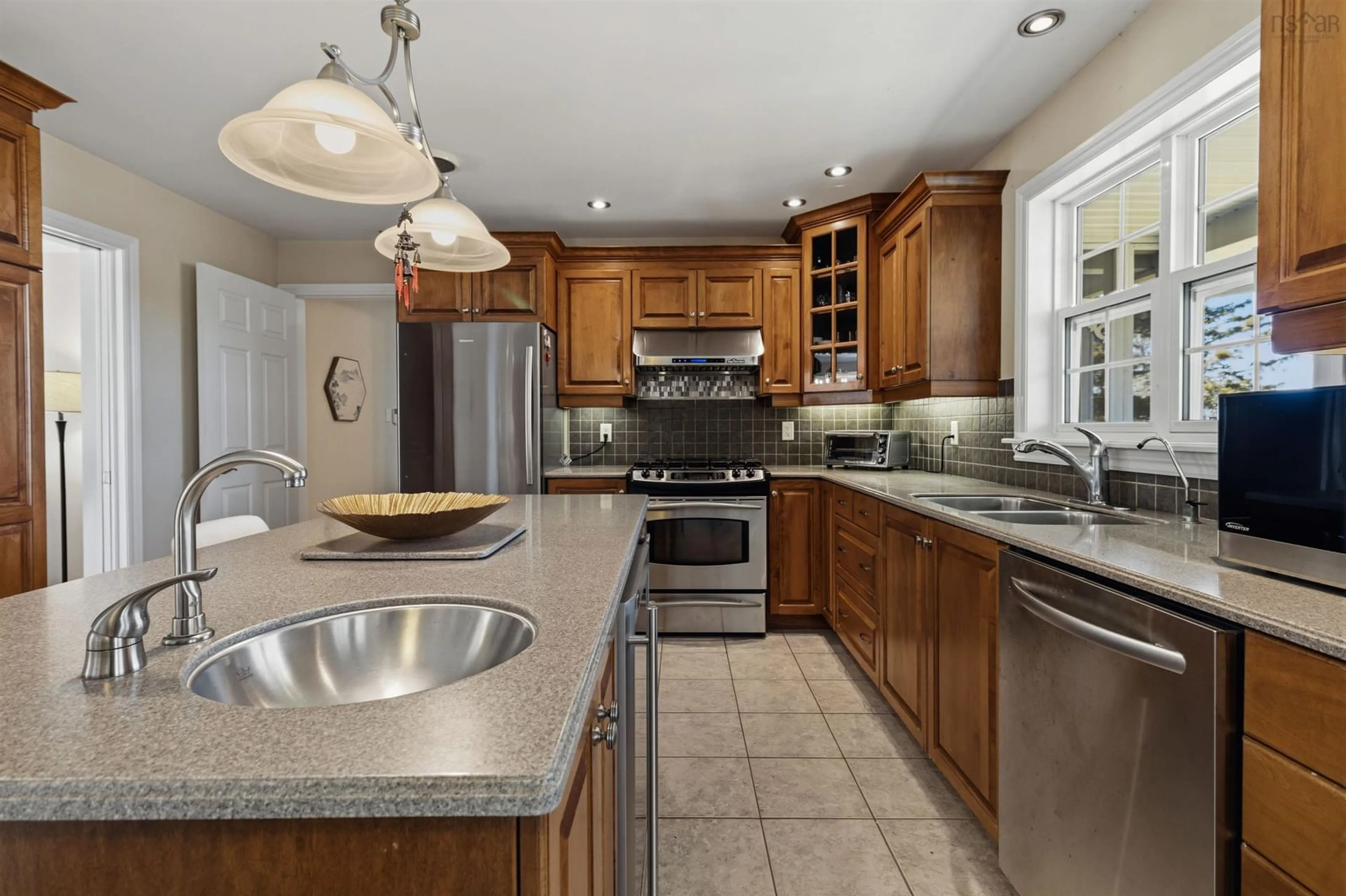 Open concept kitchen, ceramic/tile floor for 17 Paddys Head Road, Indian Harbour Nova Scotia B3Z 3X4