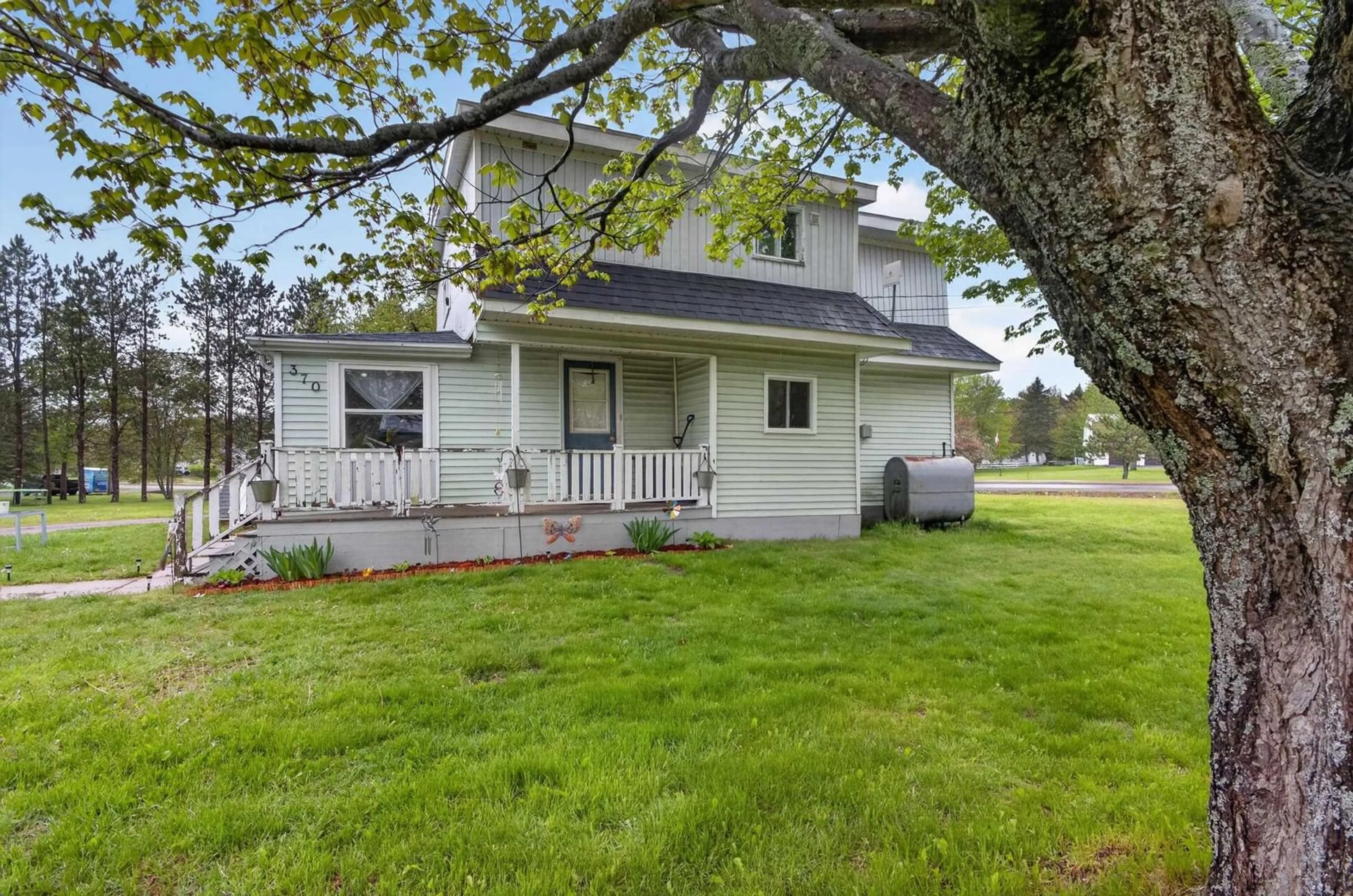 Home with vinyl exterior material, street for 370 Salmon River Rd, Salmon River Nova Scotia B6L 4E4