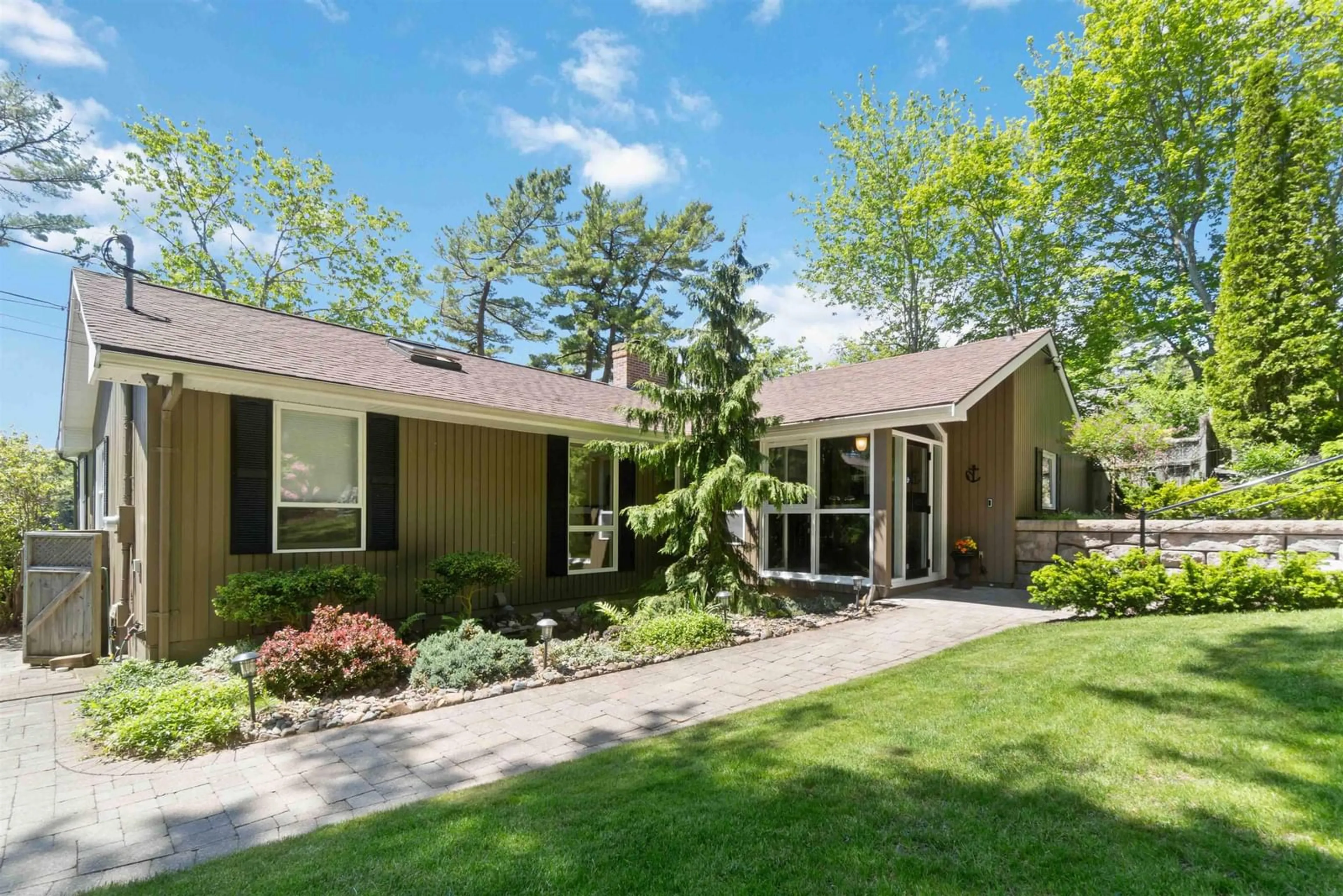 Home with vinyl exterior material, street for 1077 Shore Dr, Bedford Nova Scotia B4A 2E6