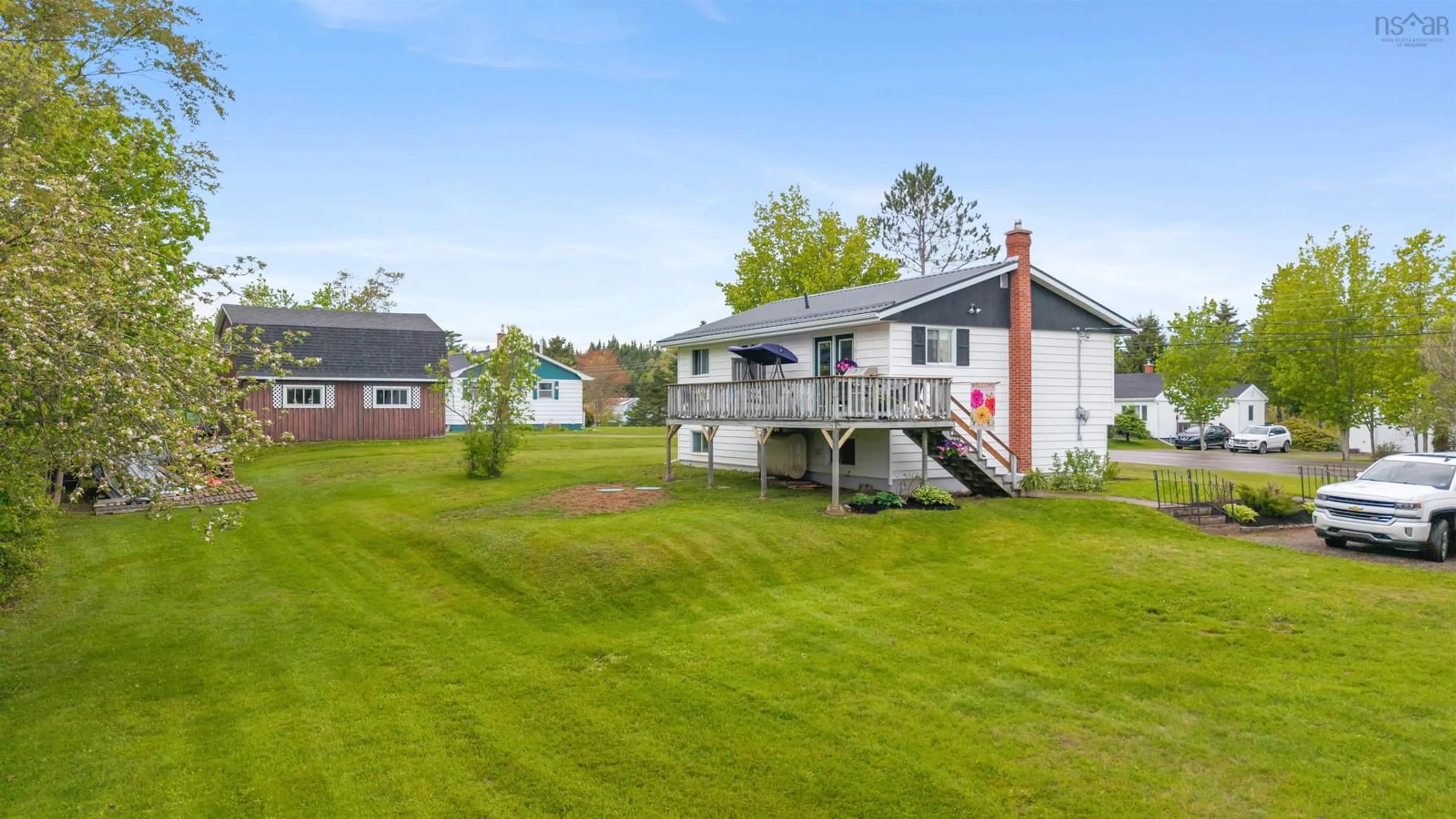 A pic from outside/outdoor area/front of a property/back of a property/a pic from drone, water/lake/river/ocean view for 914 West North River Rd, North River Nova Scotia B6L 6X9