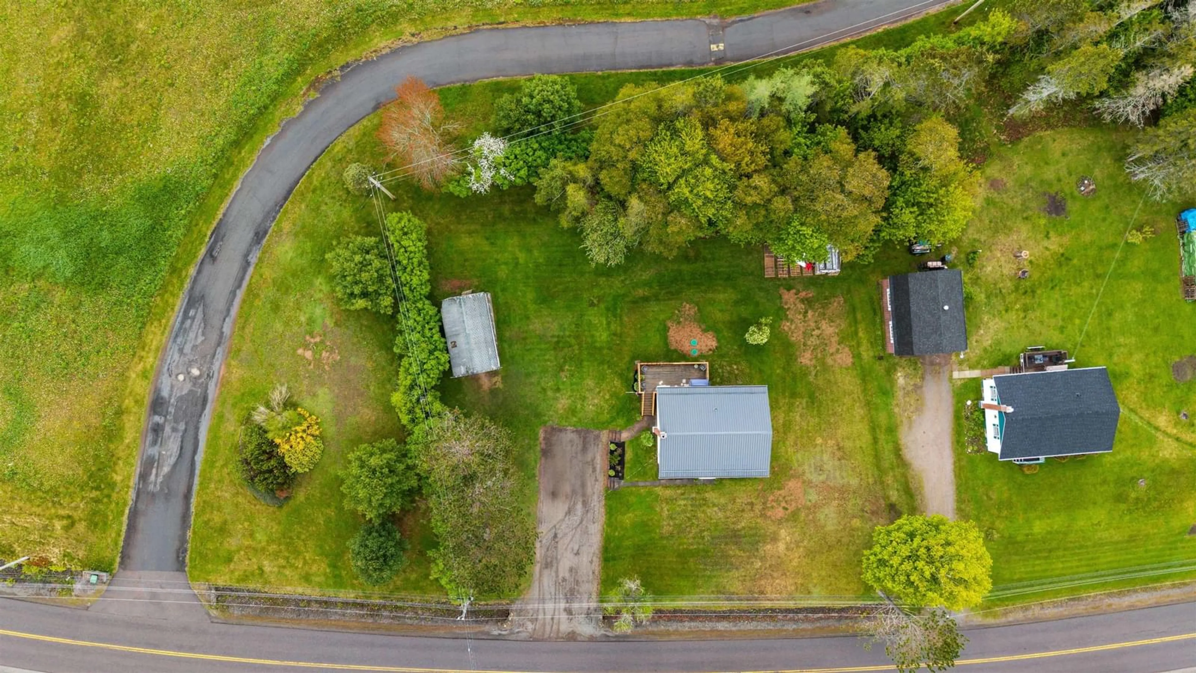 A pic from outside/outdoor area/front of a property/back of a property/a pic from drone, street for 914 West North River Rd, North River Nova Scotia B6L 6X9