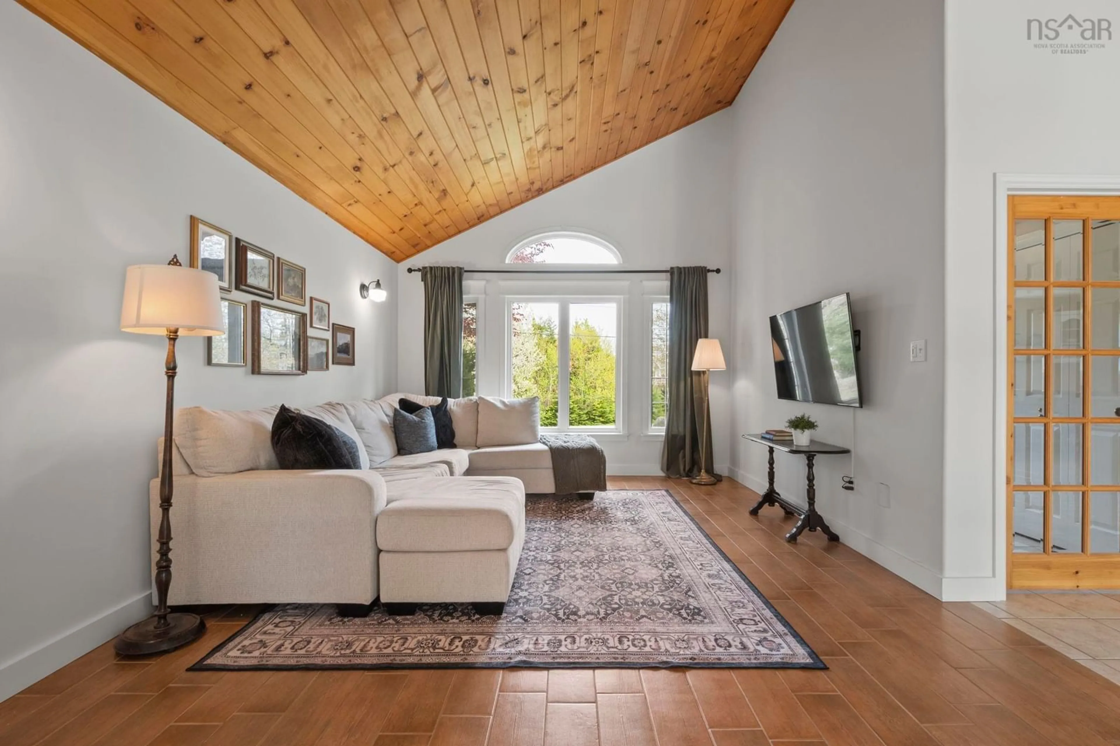 Living room with furniture, wood/laminate floor for 45 Fiddle Pky, Hatchet Lake Nova Scotia B3T 1R6