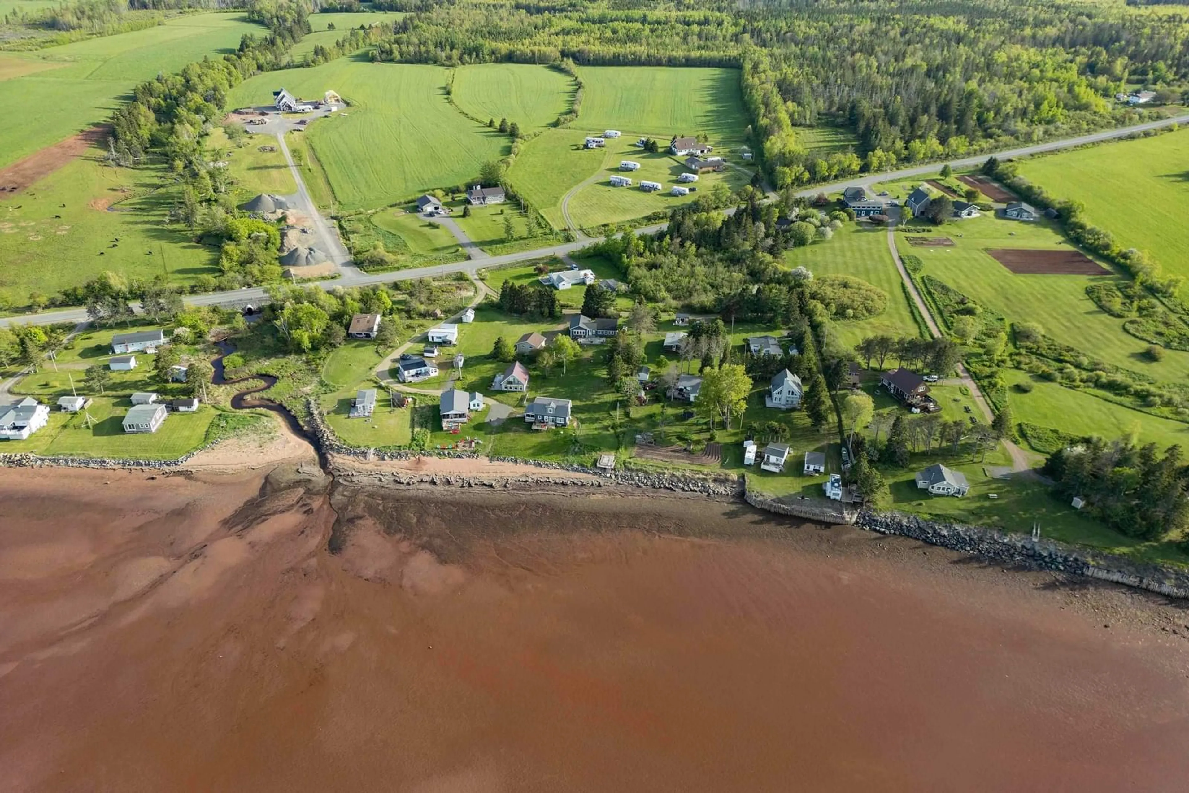 A pic from outside/outdoor area/front of a property/back of a property/a pic from drone, water/lake/river/ocean view for 5096 Highway 366, Lorneville Nova Scotia B4H 3X9