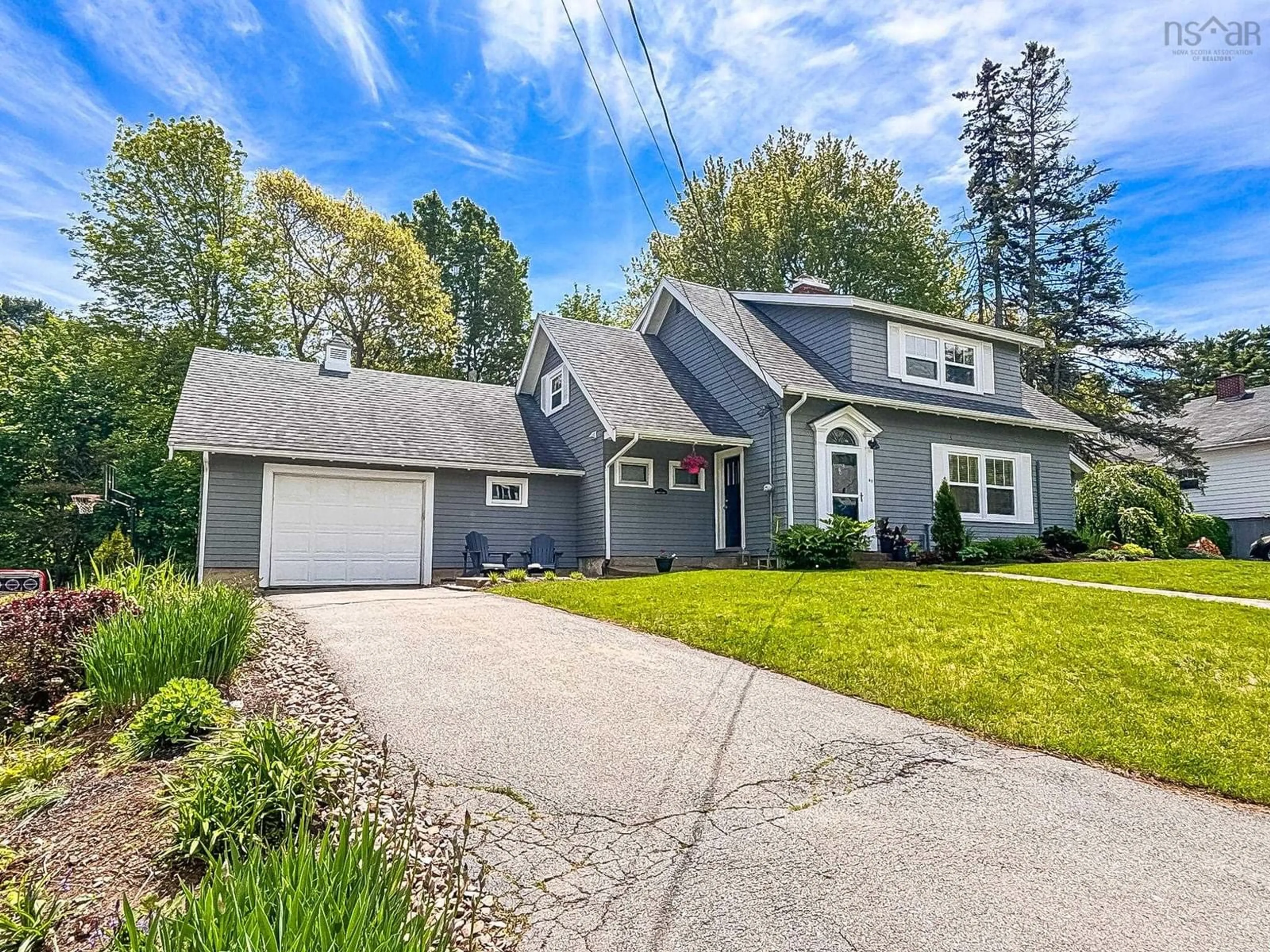 Home with vinyl exterior material, street for 65 Crescent St, Bridgewater Nova Scotia B4V 2C6